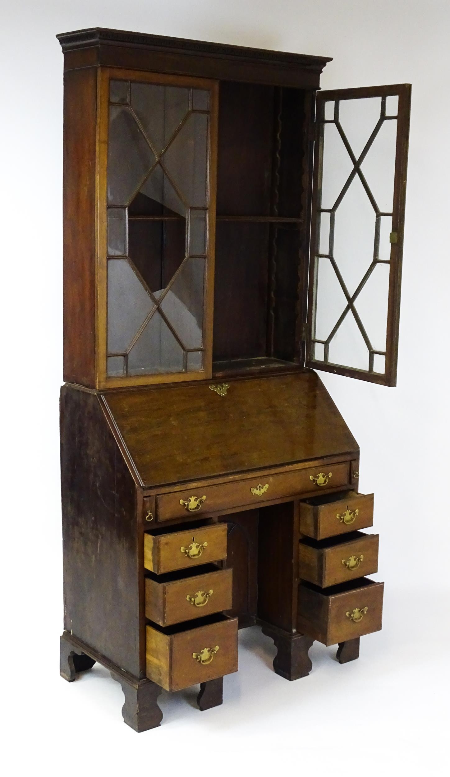 A Georgian mahogany bureau bookcase, with a moulded top above two astragal glazed doors and a fall - Image 10 of 11