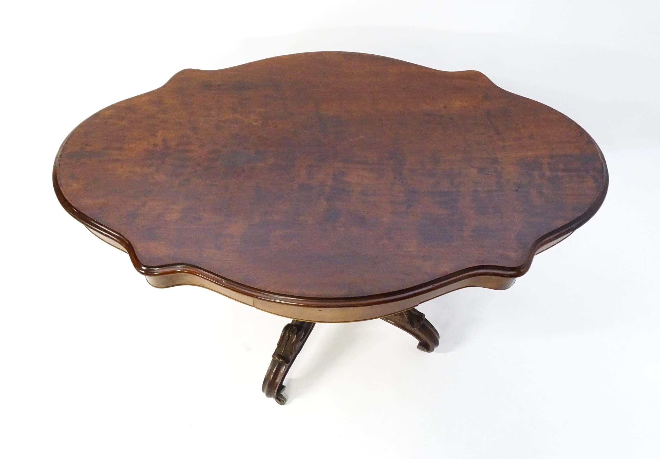 A 19thC mahogany centre table with a moulded top having two frieze drawers, the pedestal having - Image 8 of 9