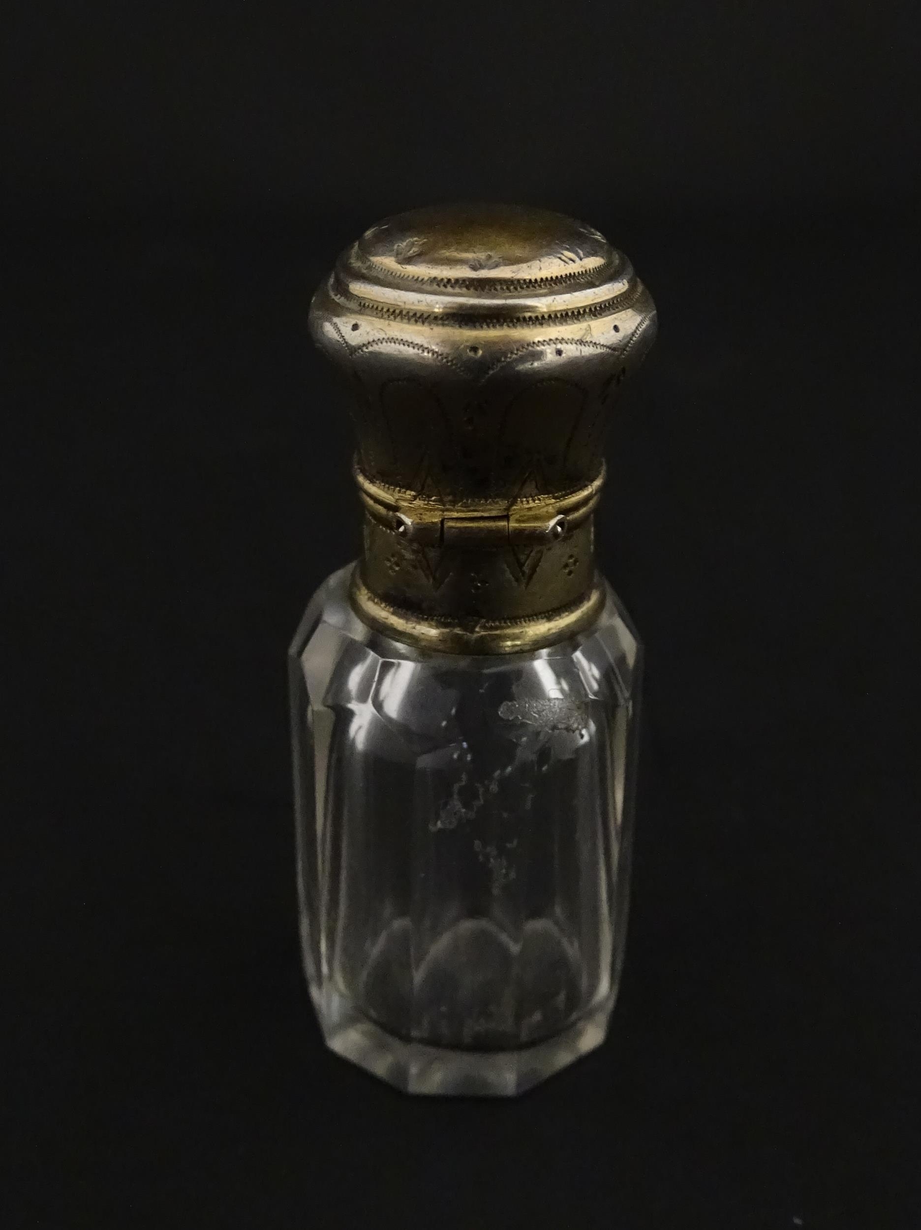 A French scent / perfume bottle with silver gilt top. Approx. 2 1/4" high Please Note - we do not - Image 8 of 10