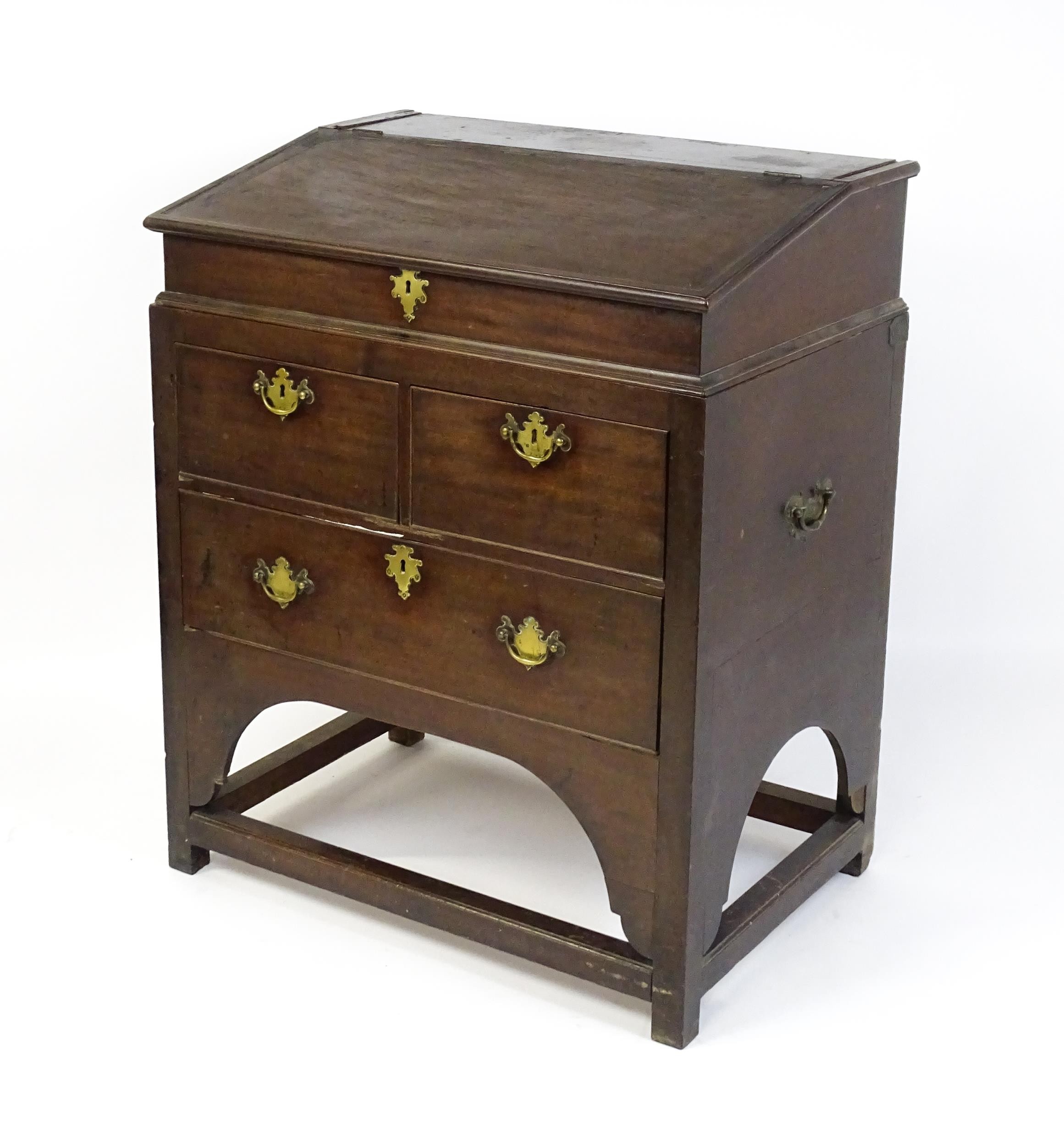 An early / mid 18thC mahogany clerks desk with a hinged sloping lid opening to show a fitted - Image 7 of 8