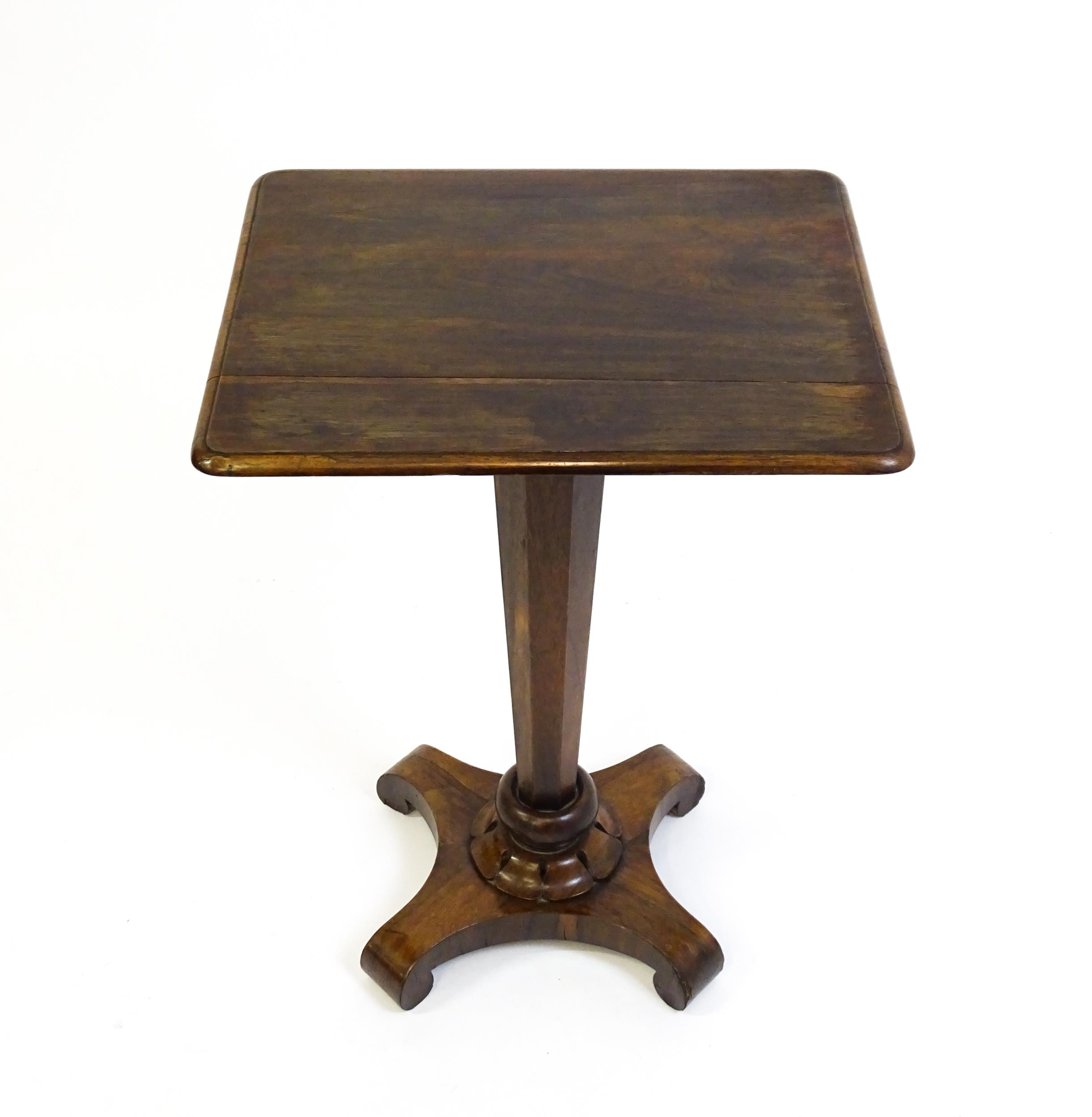 A 19thC rosewood occasional table with a canted pedestal above a carved plinth and quatre form - Image 4 of 6