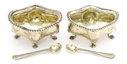 A pair of silver salts of shaped form hallmarked Birmingham 1903/4 maker Elkington & Co Ltd.