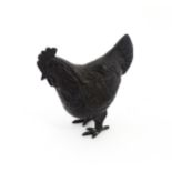 A 20thC cast model of a cockerel / rooster with feather detail. Approx. 4 3/4" high Please Note - we