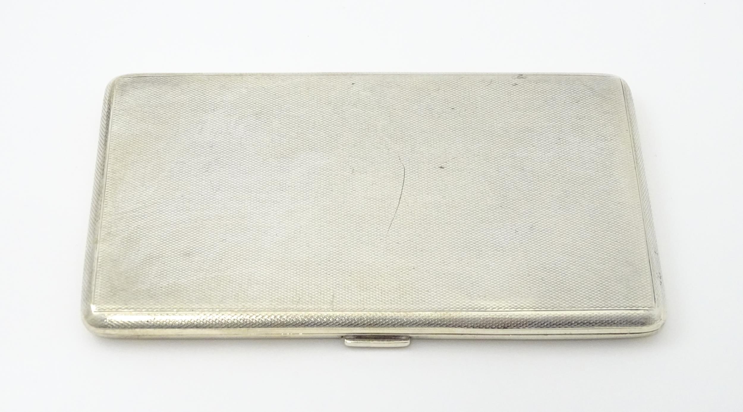 An Art Deco silver cigarette case with three sectional interior hallmarked Birmingham 1933, maker - Image 2 of 11