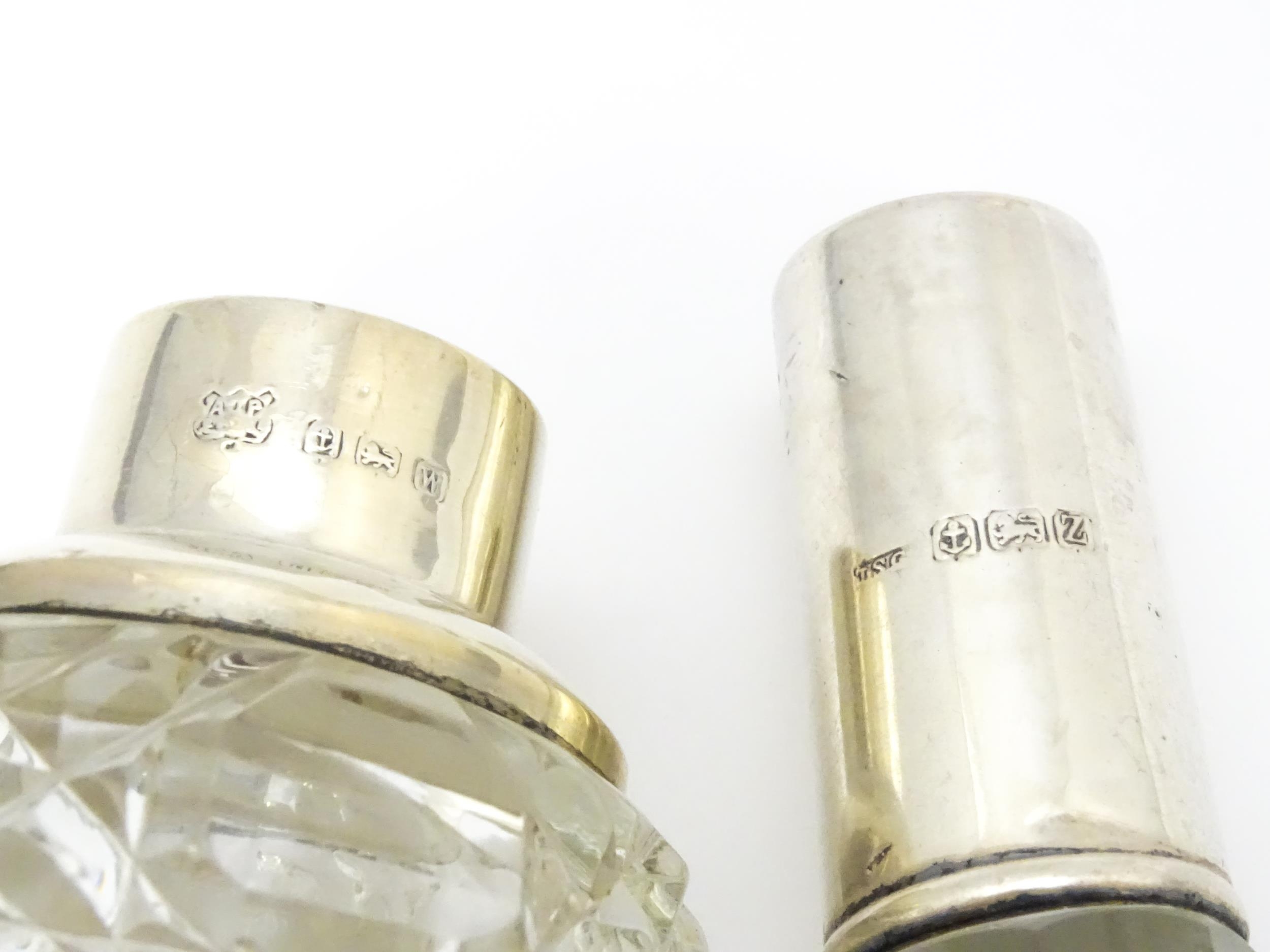 Two cut glass scent / perfume bottles with silver mounts, one hallmarked Birmingham 1921, maker A - Image 3 of 15