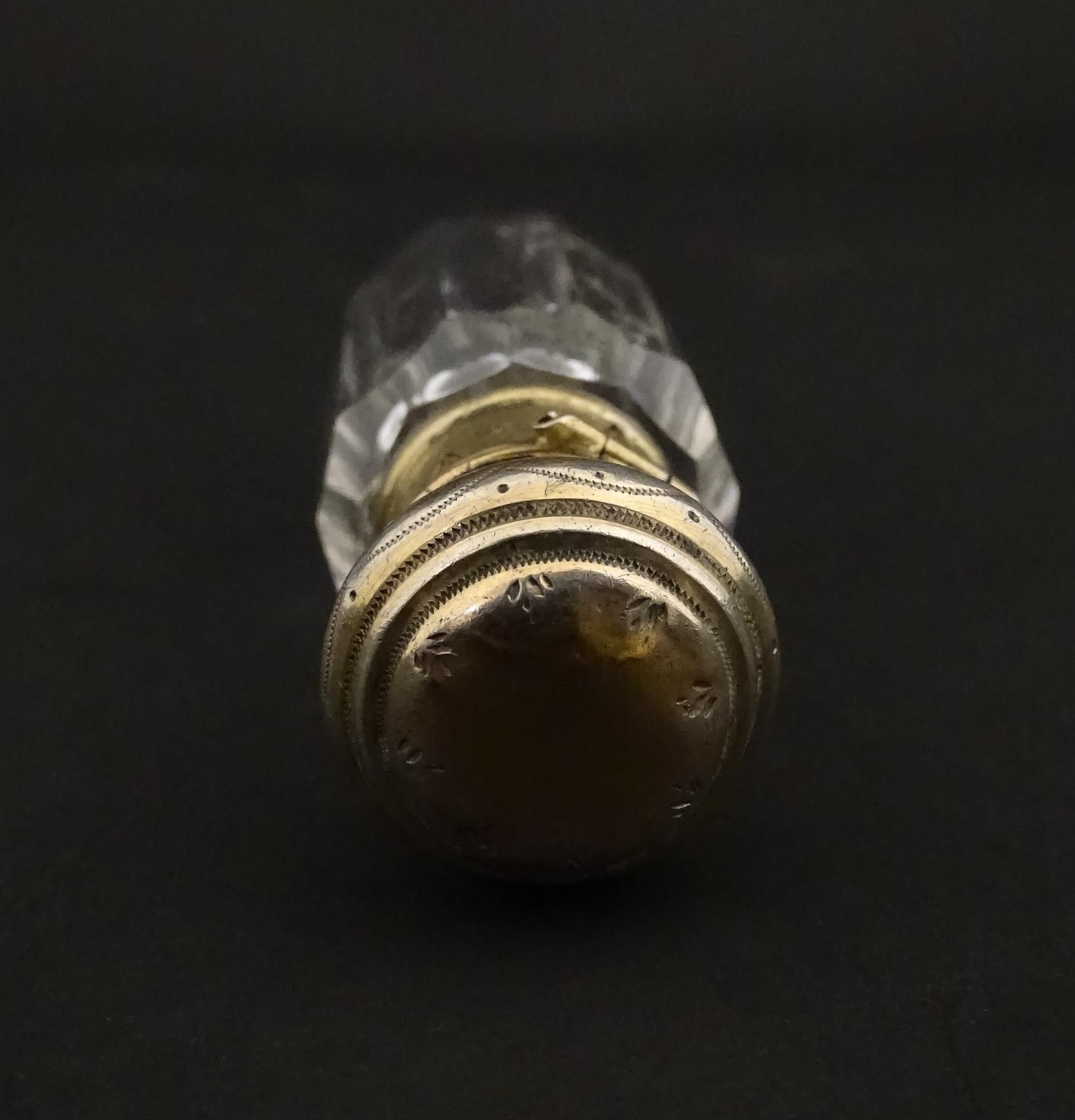A French scent / perfume bottle with silver gilt top. Approx. 2 1/4" high Please Note - we do not - Image 10 of 10