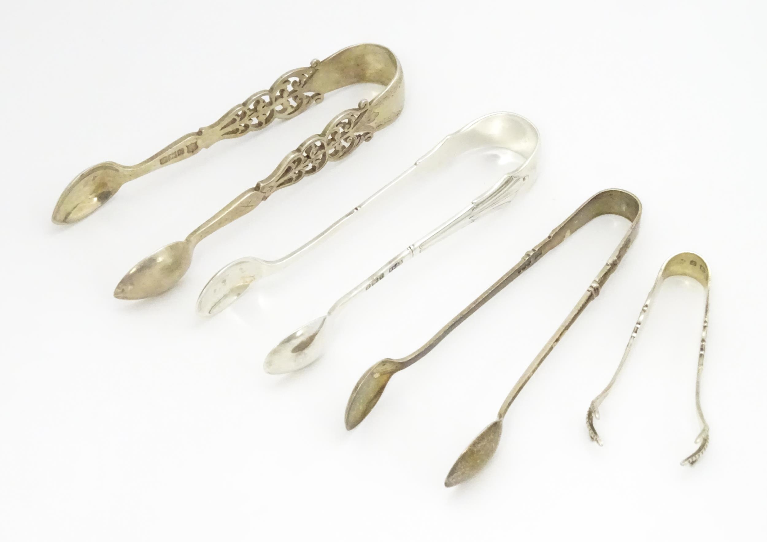 Four assorted silver sugar tongs, to include and Albany pattern example hallmarked Sheffield 1903, - Image 3 of 13