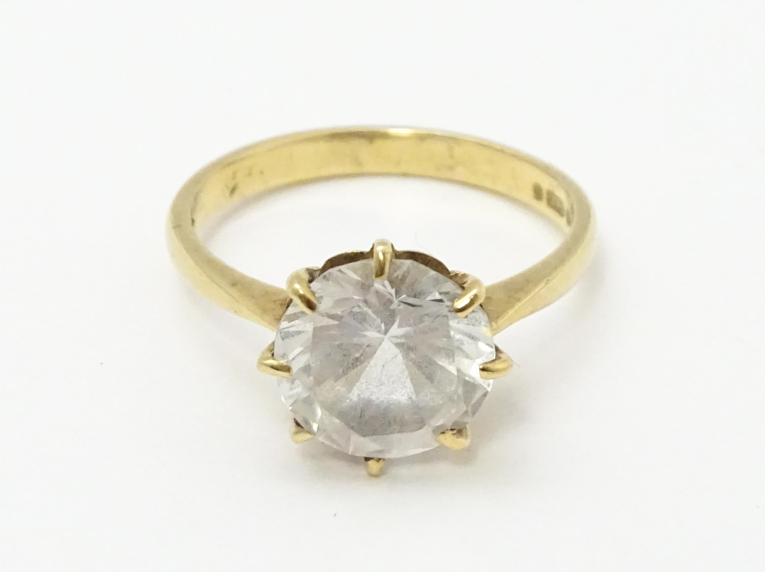 A 9ct gold ring set with a white stone solitaire. Ring size approx. O Please Note - we do not make - Image 2 of 7