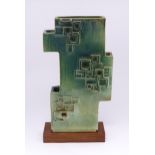 An abstract studio pottery sculpture / vase with square detail by Stephen Bailey. Stamped to base.