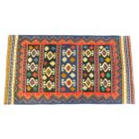 Carpet / Rug : A North East Persian Sumak kilim rug with banded geometric decoration. Approx. 79"