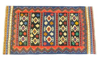 Carpet / Rug : A North East Persian Sumak kilim rug with banded geometric decoration. Approx. 79"