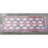 Carpet / Rug : A Persian Ardebil runner, the cream ground with floral and geometric repeating detail