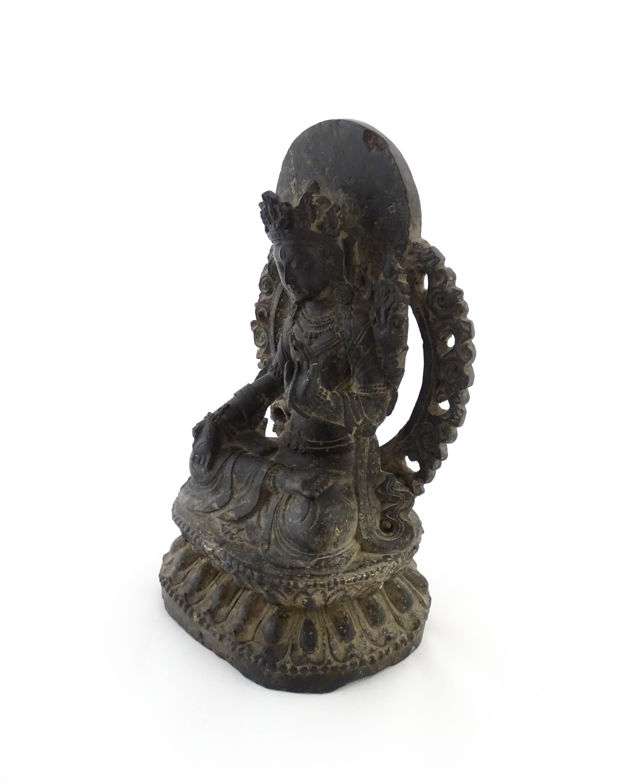 An Asian carved soapstone model of a seated deity on a stylised lotus. Approx. 14 1/2" high Please - Image 7 of 8