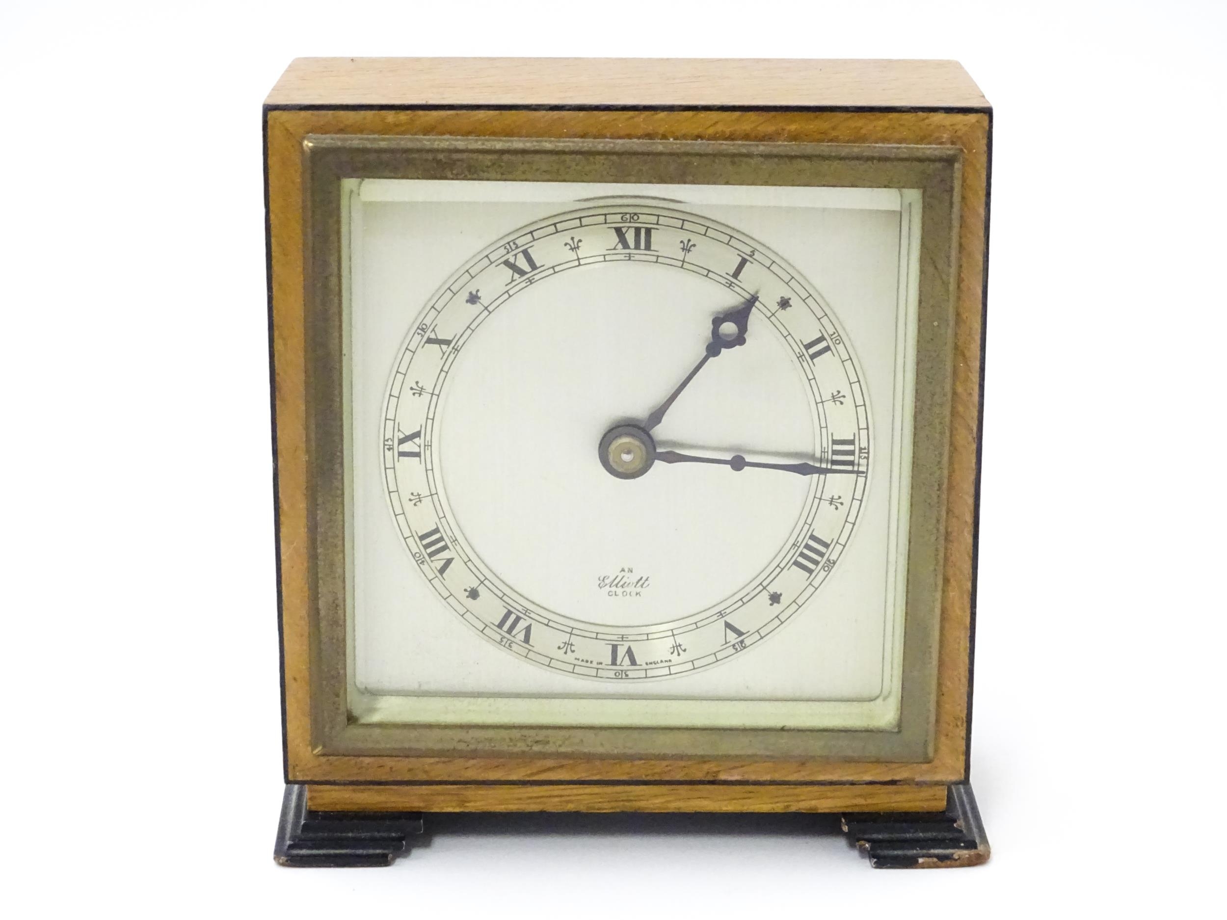A 20thC mantle clock by Elliott. the dial with Roman numeral chapter ring and signed ' An Elliott - Image 2 of 8