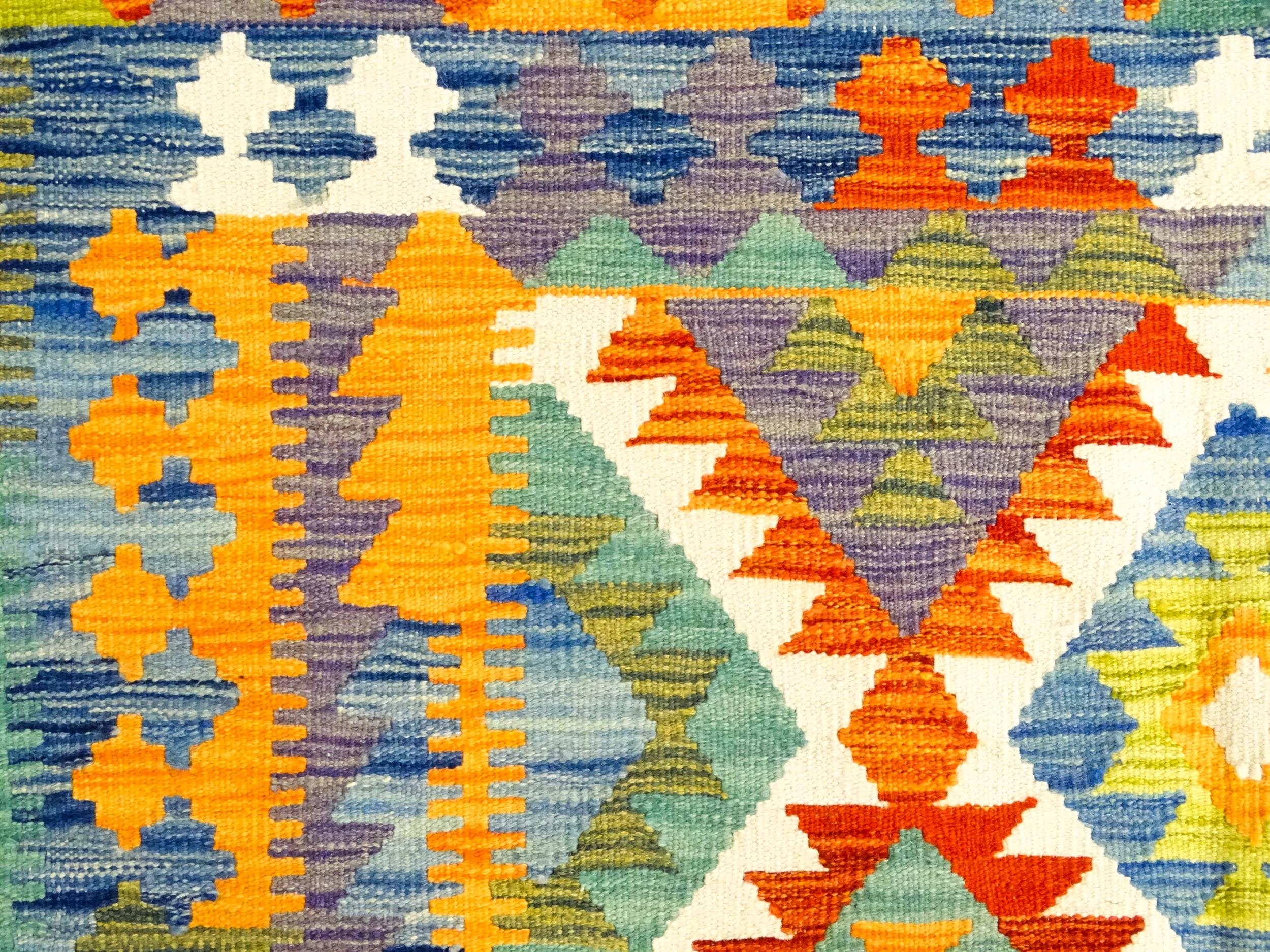 Carpet / Rug : A Turkish Anatolian kilim rug with repeating geometric motifs. Approx. 80" x 55" - Image 5 of 7
