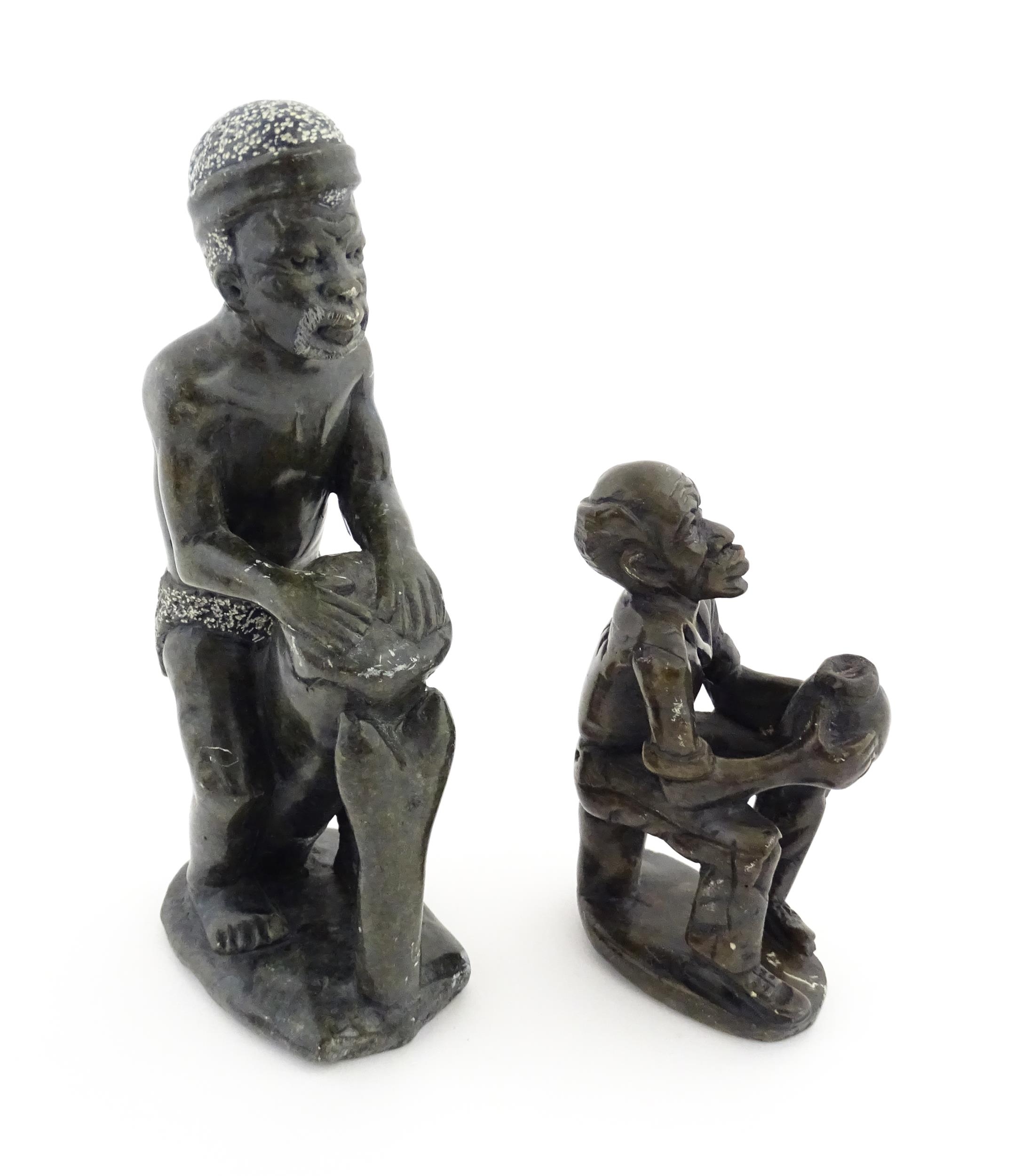 Ethnographic / Native / Tribal : An African soapstone carving modelled as a tribesman playing a - Image 3 of 6