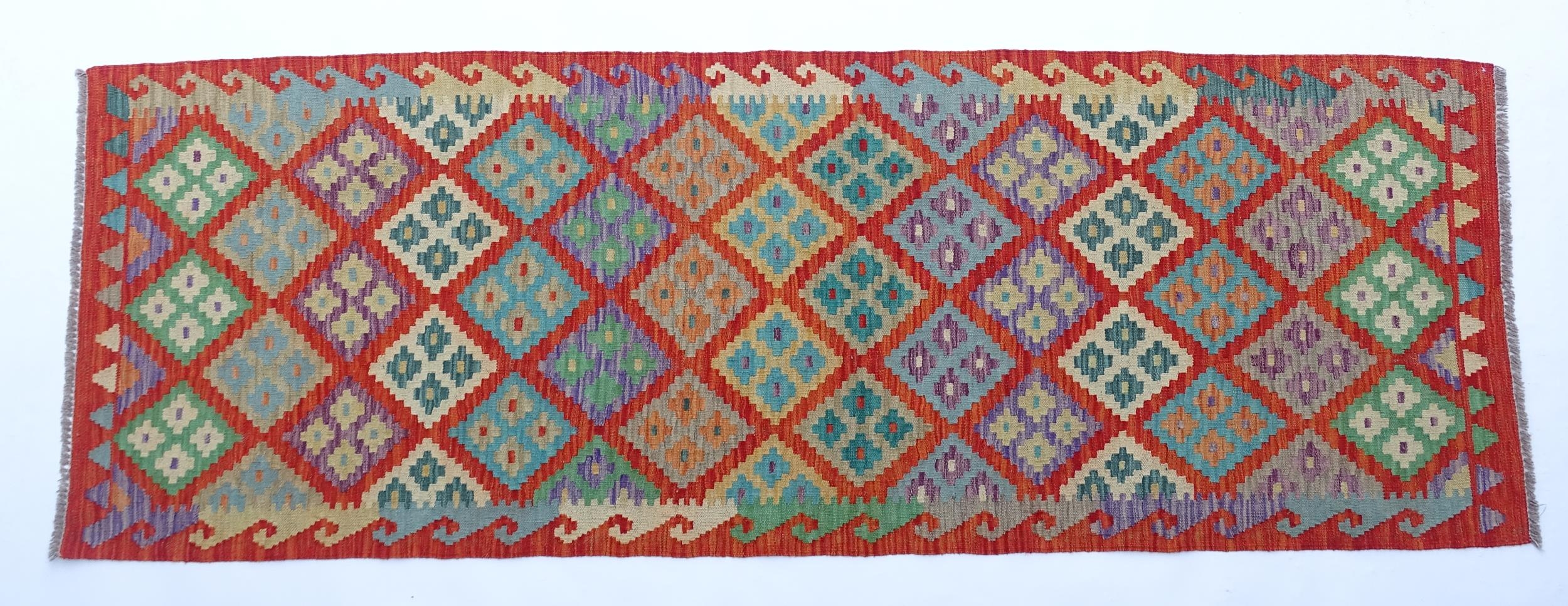 Carpet / Rug: A Turkish Anatolian kilim decorated with geometric motifs. Approx. 97" x 34" Please - Image 3 of 9