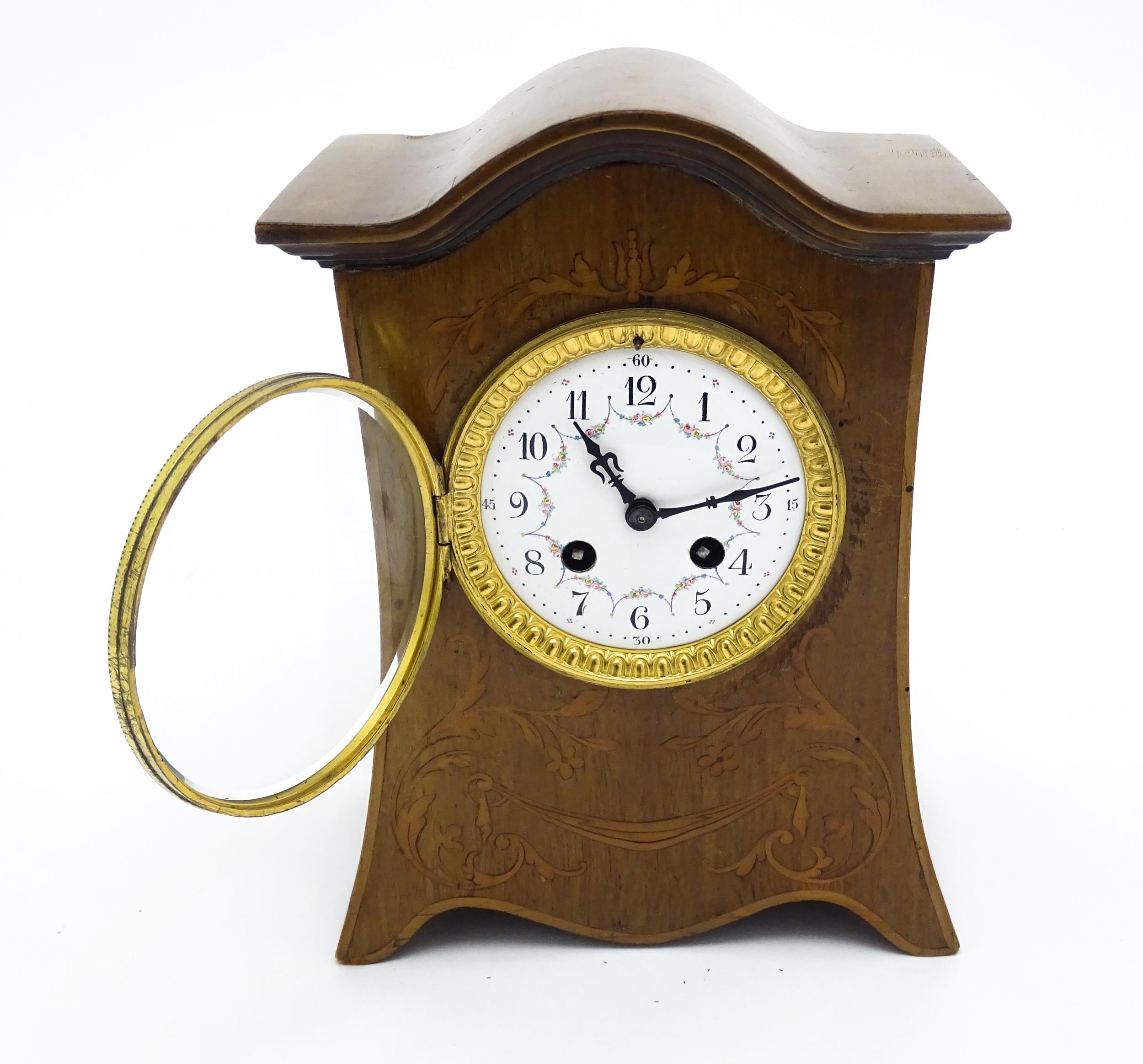 A late 19thC / early 20thC mahogany cased French mantle clock with satinwood inlay and white - Image 7 of 10