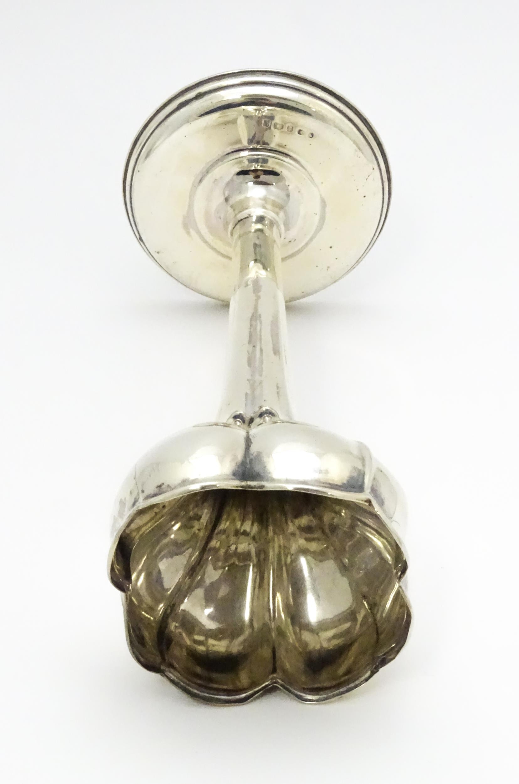 A silver bud vase hallmarked Birmingham 1904. Approx. 7 1/2" high Please Note - we do not make - Image 4 of 6