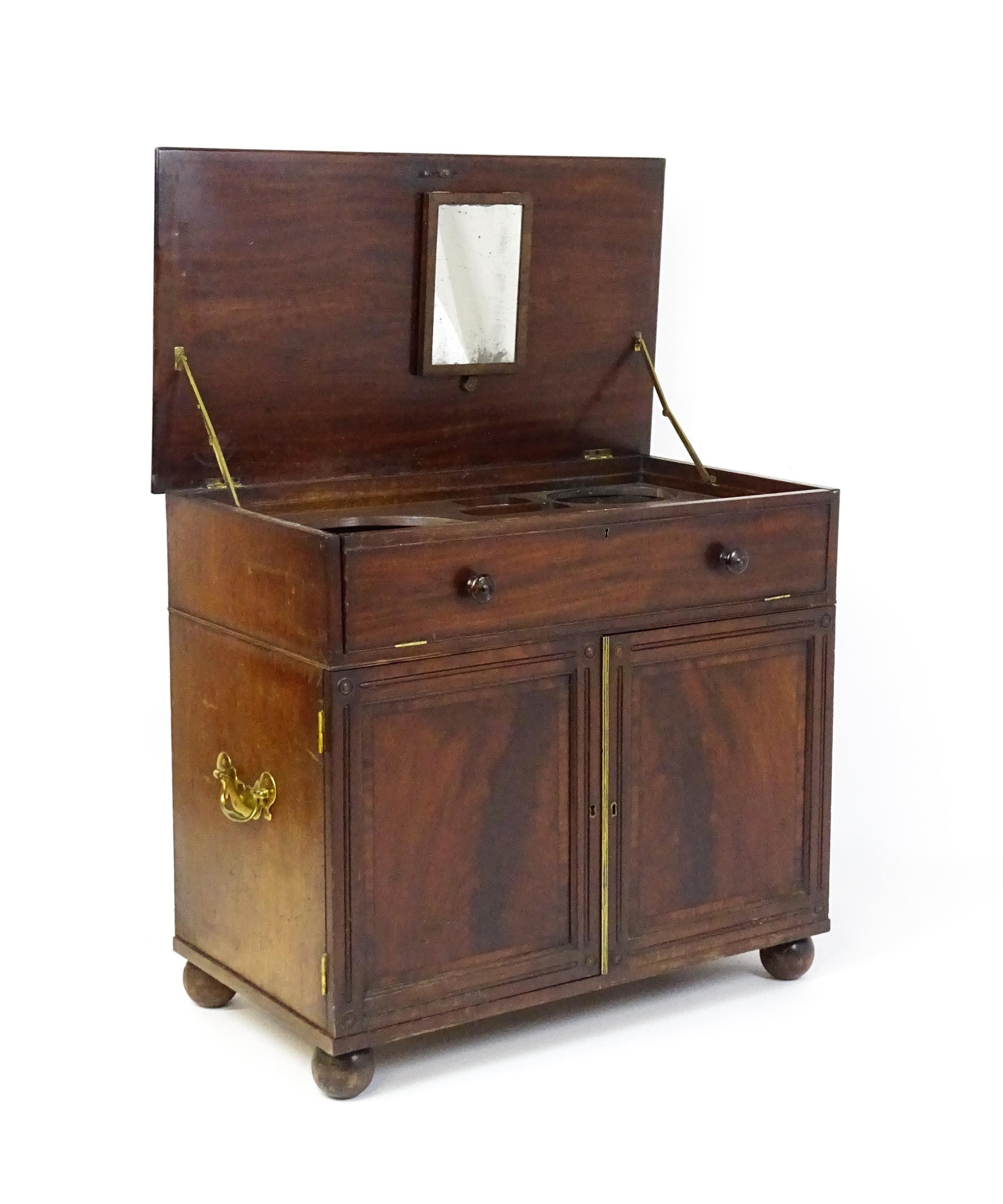 A Georgian mahogany campaign washstand with a mirror to the interior and sections for internal - Image 6 of 11