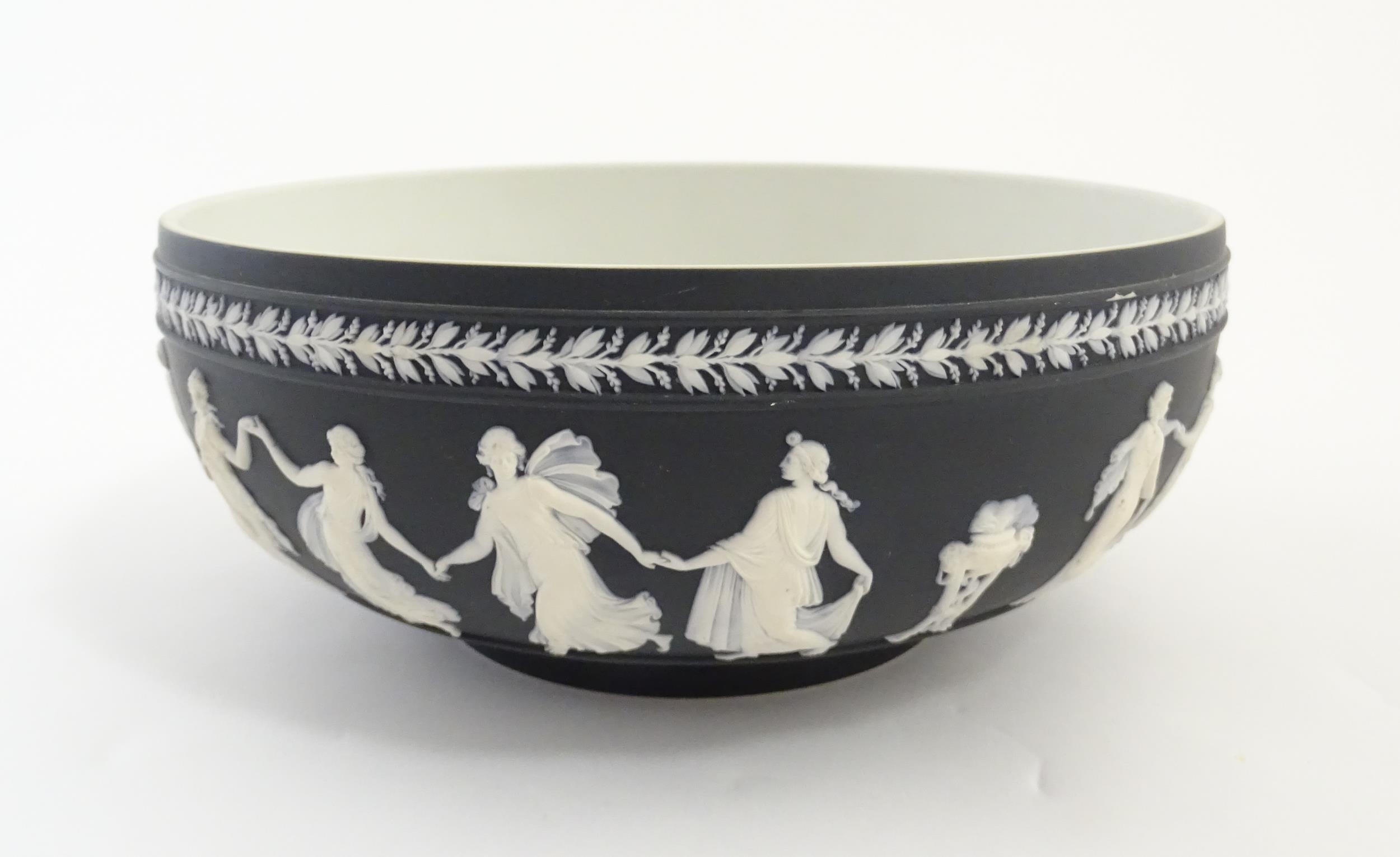 A Wedgwood black Jasperware bowl decorated with Classical maidens / Dancing Hours. Marked under. - Image 4 of 9