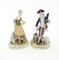 A pair of German figures comprising Shepherd and Shepherdess. Marked under. Approx. 6 1/2" high