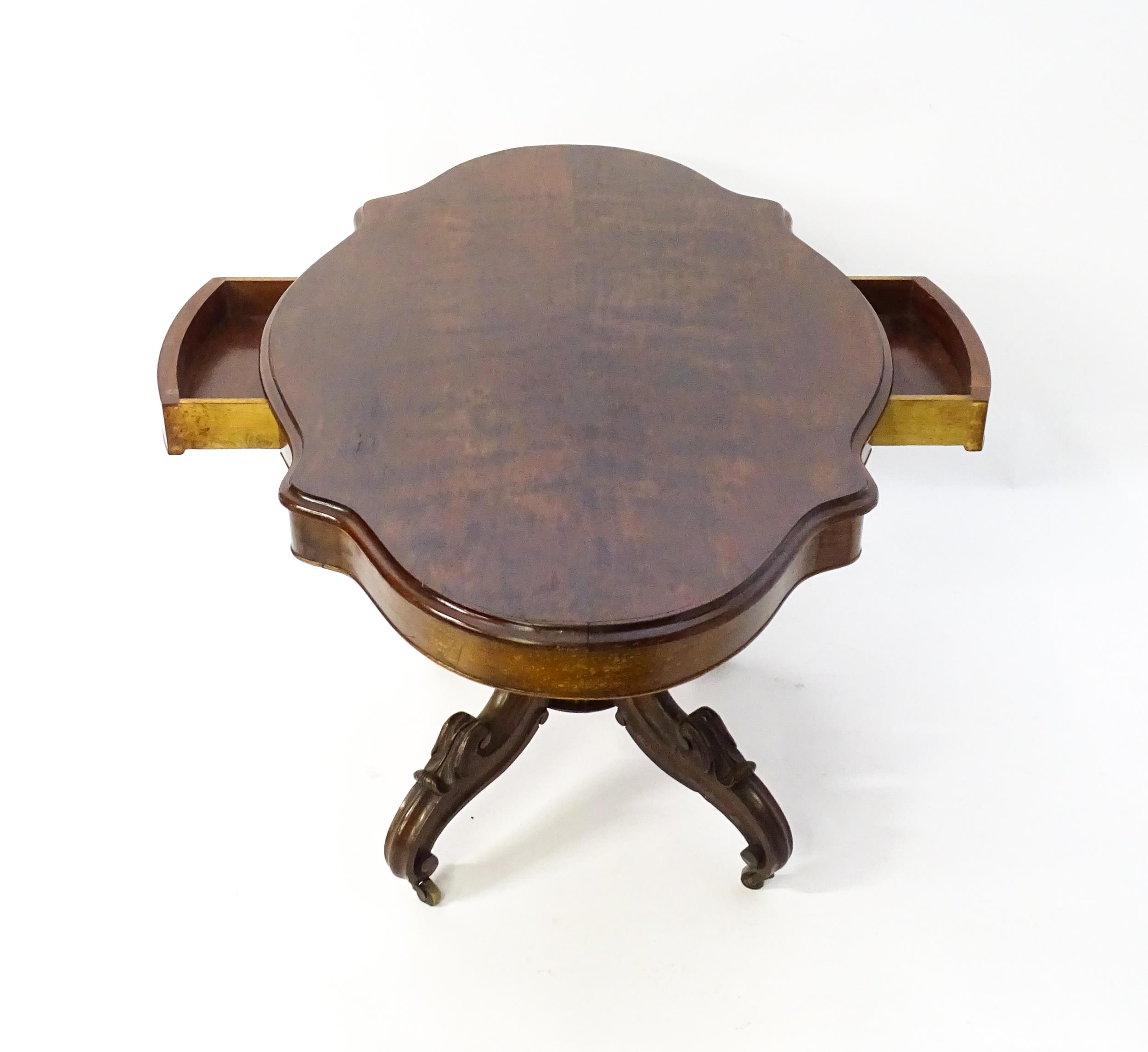 A 19thC mahogany centre table with a moulded top having two frieze drawers, the pedestal having - Image 2 of 9