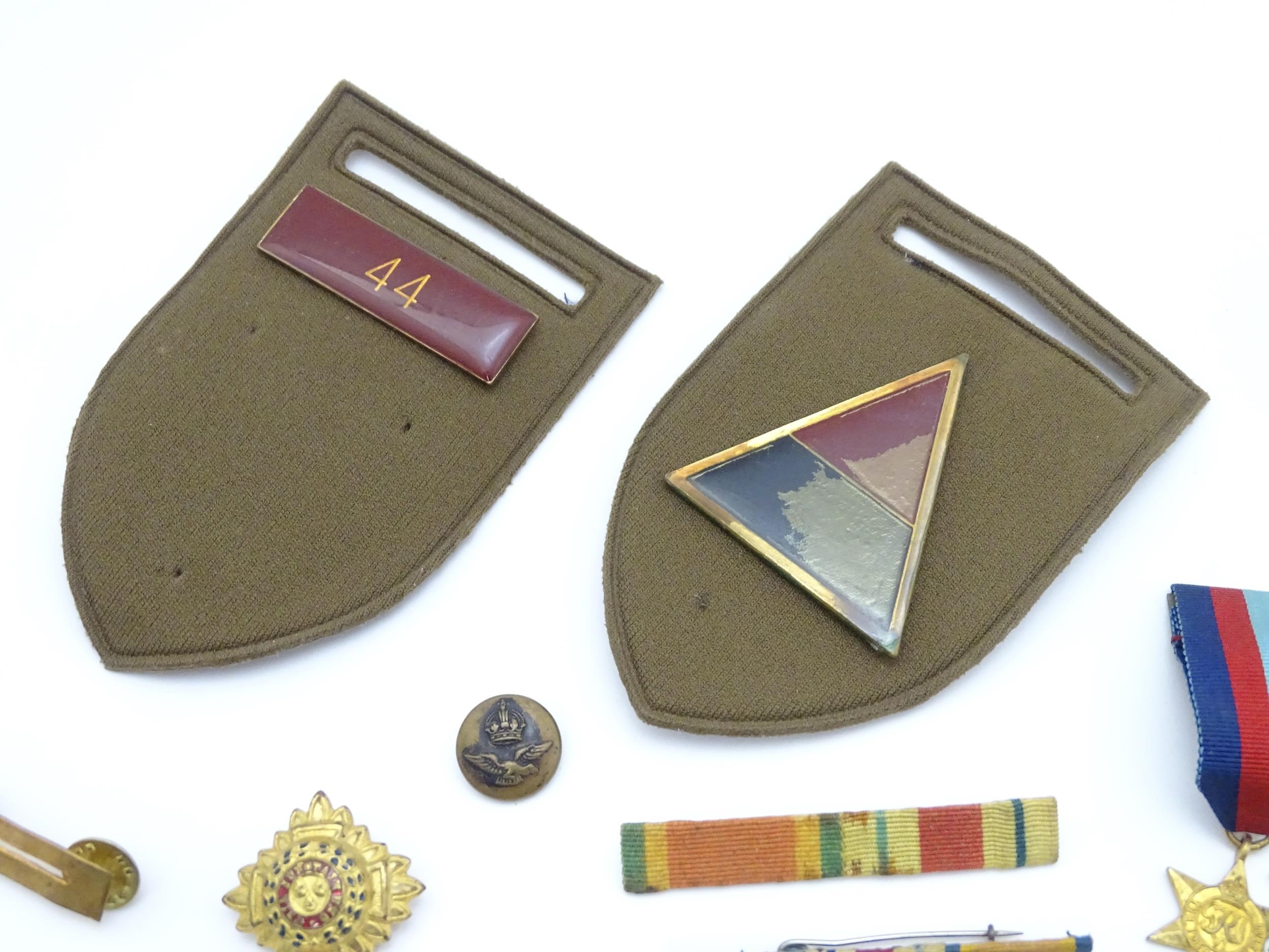 Militaria : a quantity of 20thC medals and insignia, comprising two WWI campaign medals to Gnr. W. - Image 8 of 16