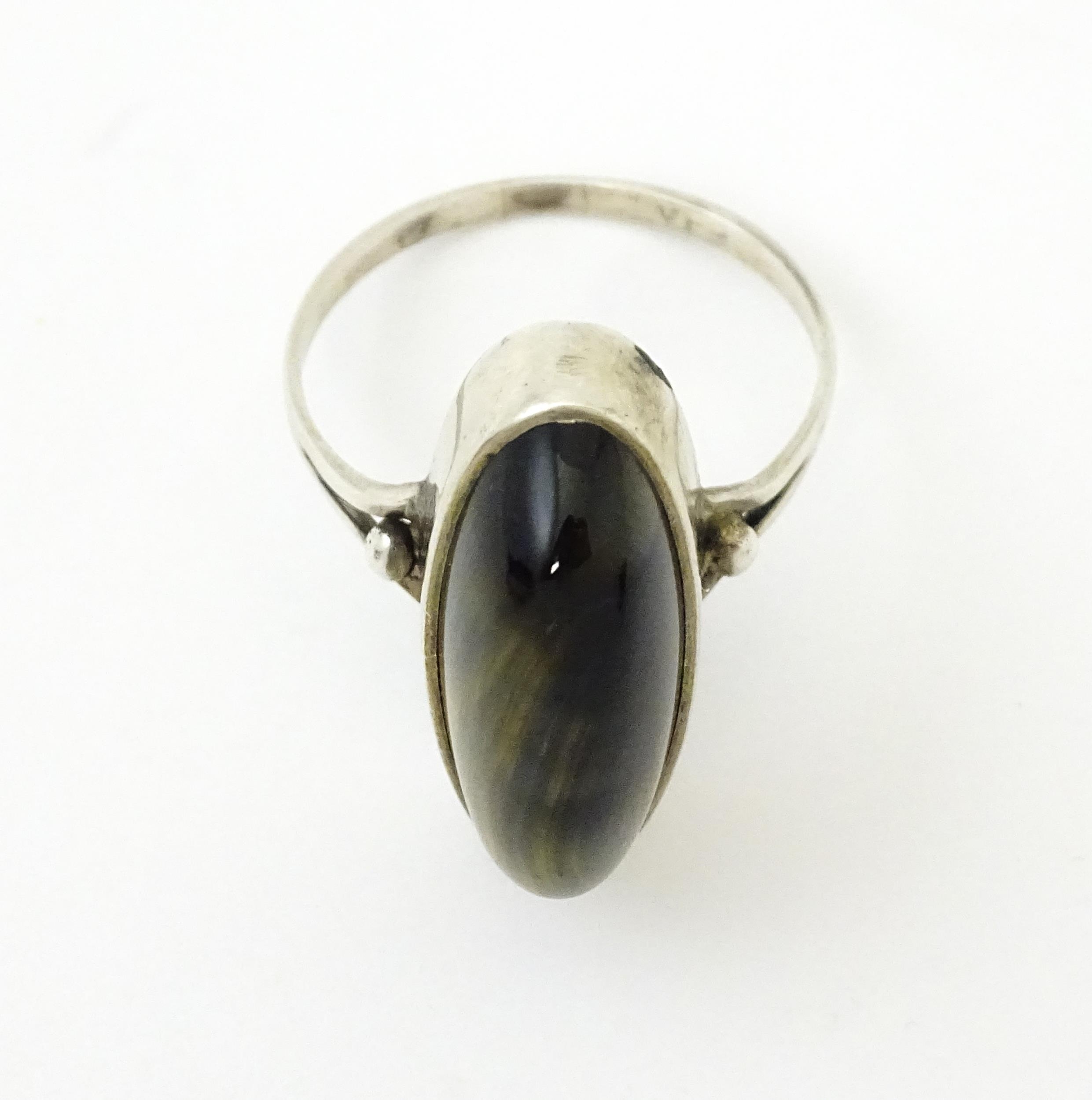 A silver ring set with cabochon. Ring size approx. S Please Note - we do not make reference to the - Image 2 of 8