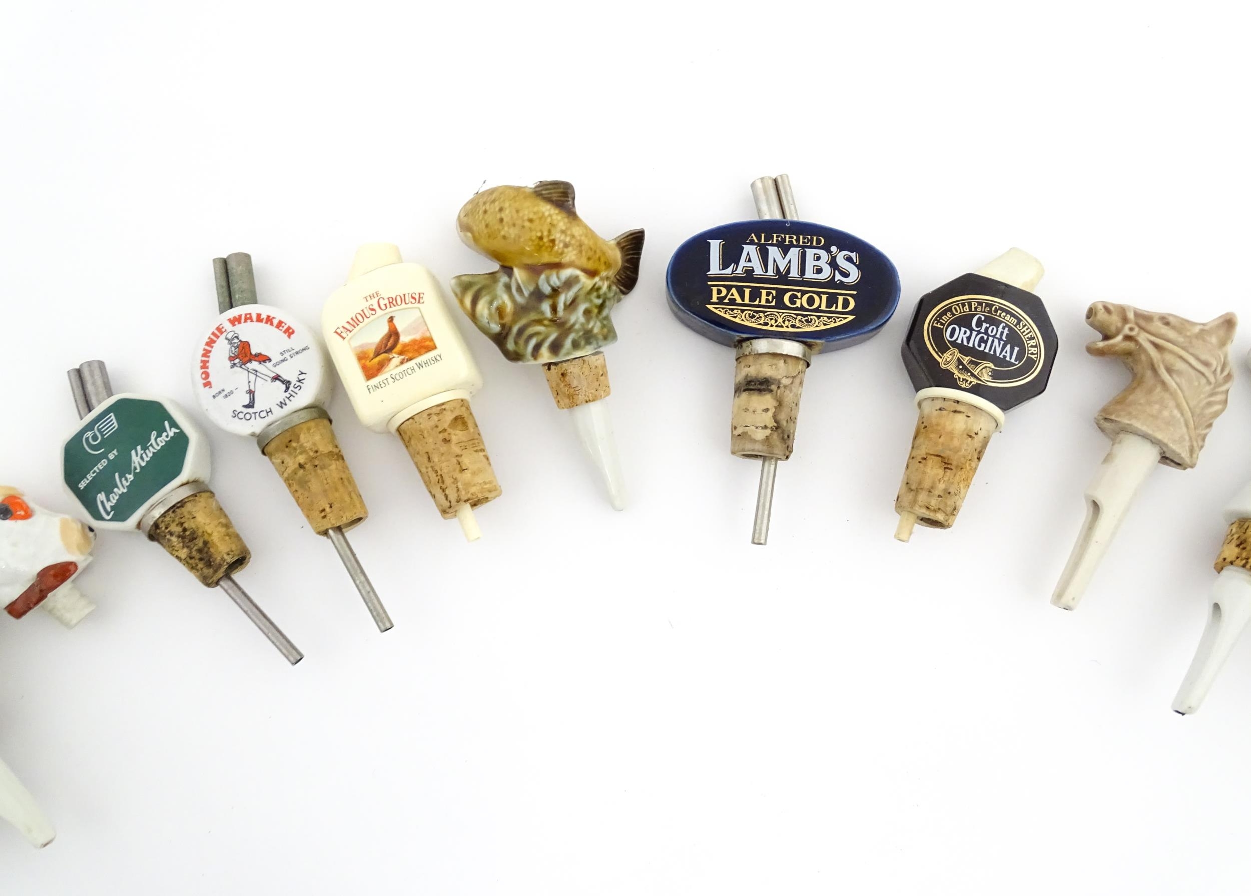 Breweriana : A quantity of assorted 20thC advertising bottle stoppers / pourers to include Booth's - Image 15 of 16