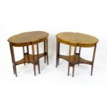 A pair of late 19thC / early 20thC mahogany side tables, each with shaped tops and having eight