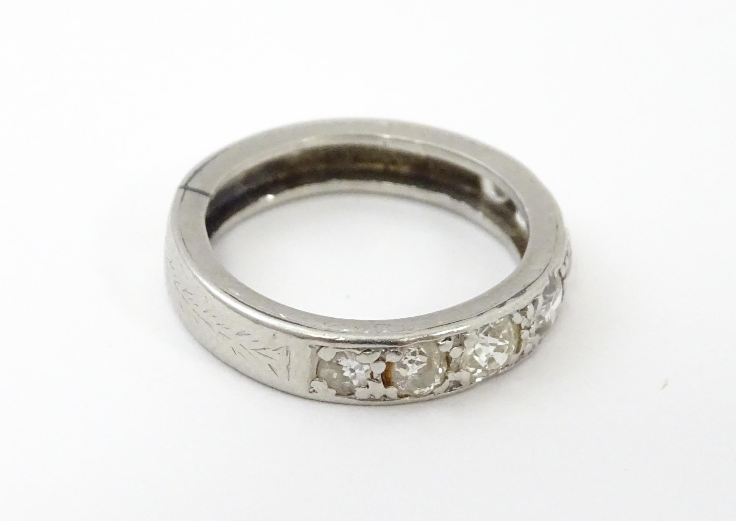 A diamond half eternity ring set with 7 diamonds. Ring size approx. L Please Note - we do not make - Image 7 of 9