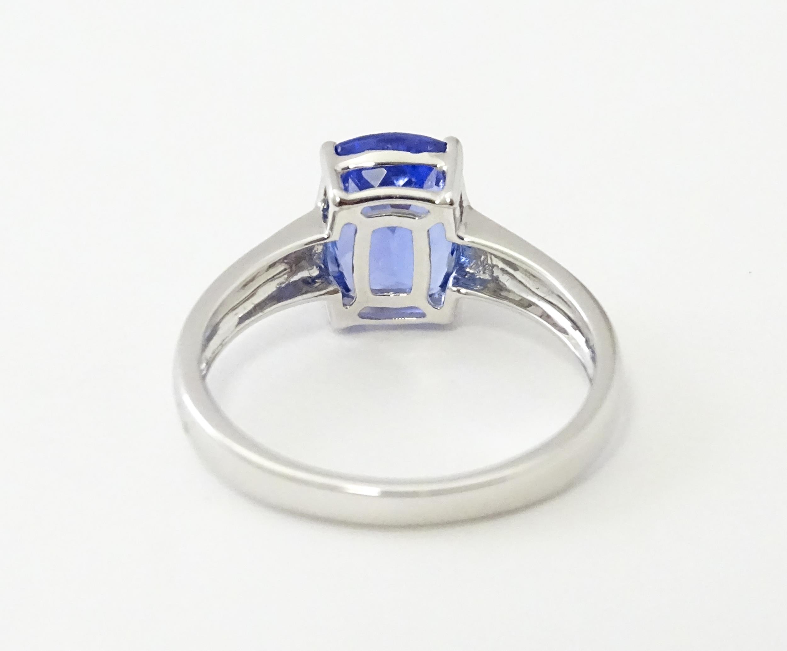 An 18ct white gold ring set with tanzanite. Ring size approx. N. Please Note - we do not make - Image 4 of 6