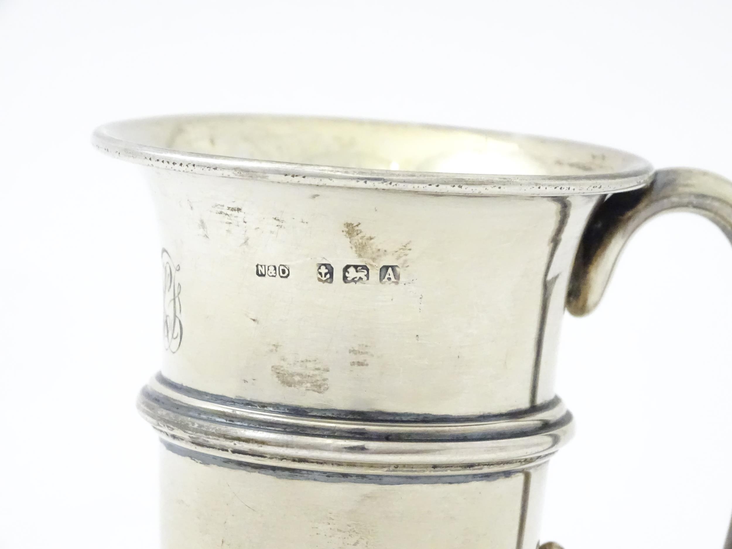 A silver mug with loop handle and gilded interior, hallmarked Birmingham 1925, maker Napper & - Image 7 of 8