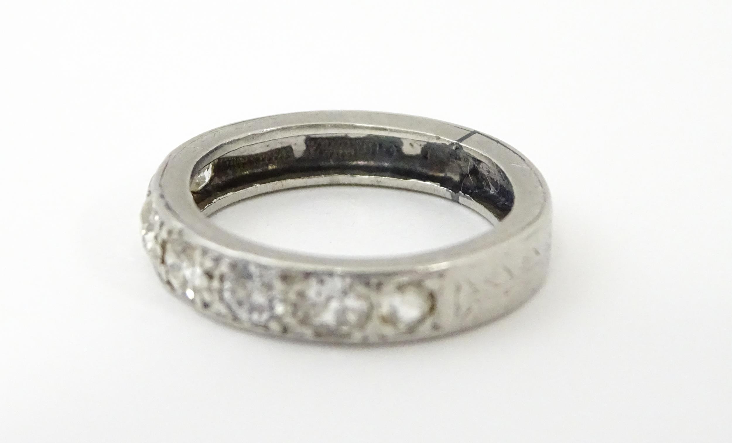 A diamond half eternity ring set with 7 diamonds. Ring size approx. L Please Note - we do not make - Image 9 of 9