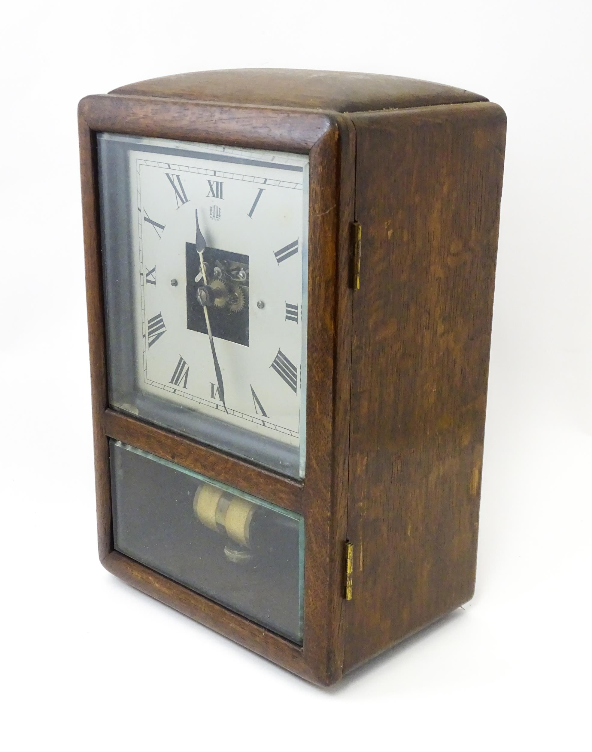 Bulle : A French Art Deco oak cased electric mantel clock by Bulle. The dial signed Bulle Patent - Image 8 of 9