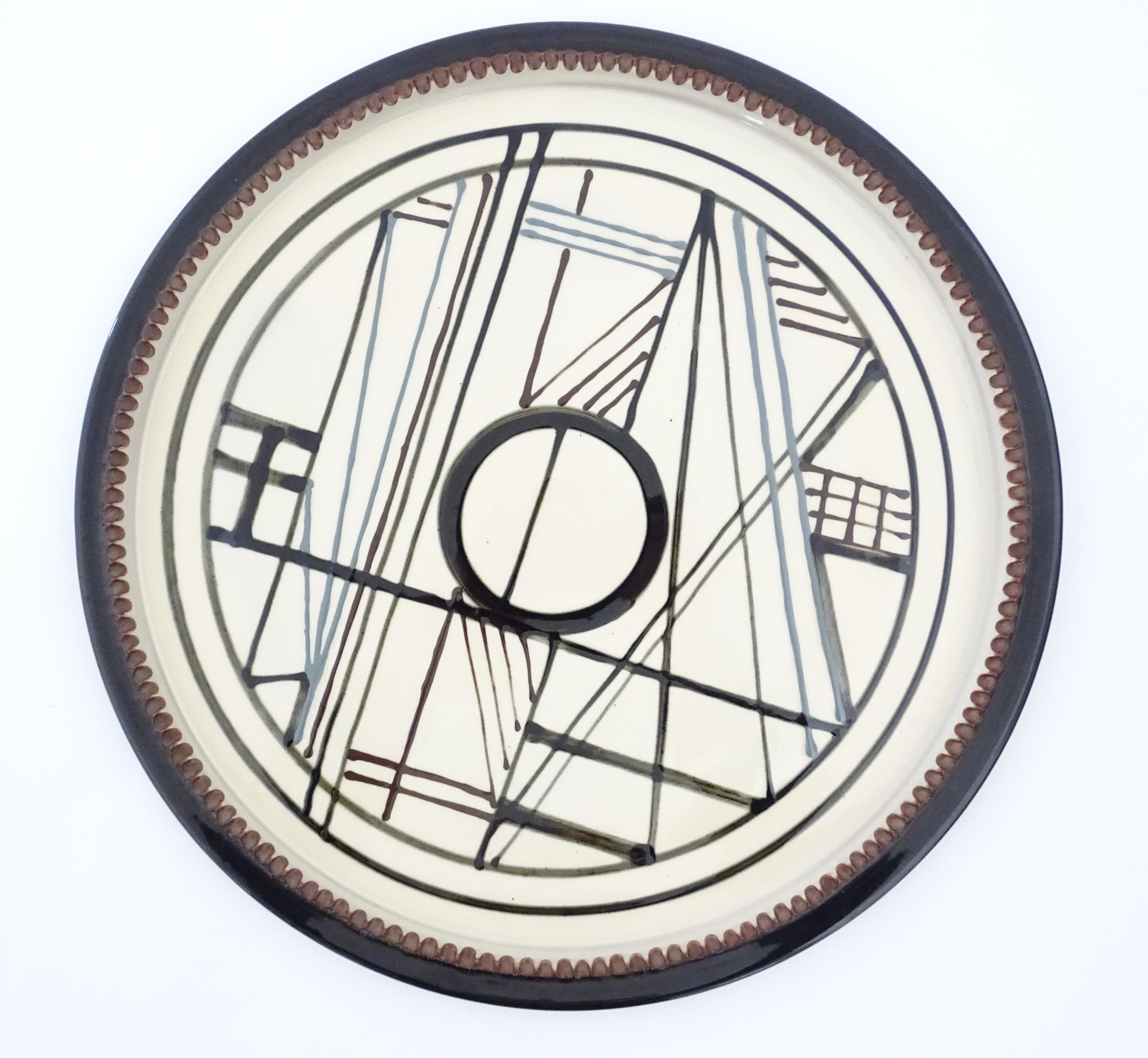 A studio pottery terracotta charger with geometric / linear detail. Indistinctly signed under. - Image 3 of 4