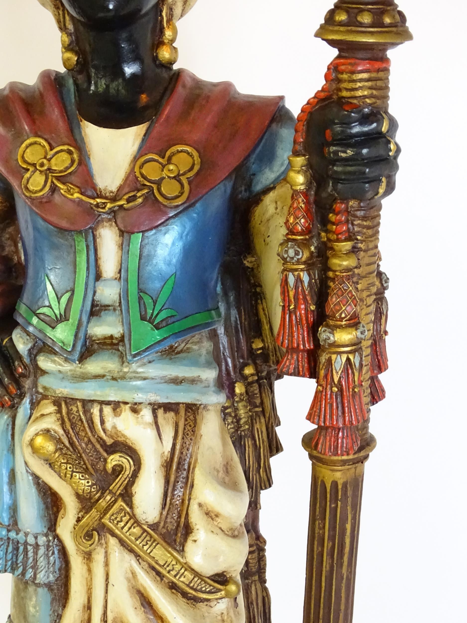 A mid 20thC blackamoor lamp, the lamp having a polychrome figural top grasping a torchiere, the - Image 10 of 14