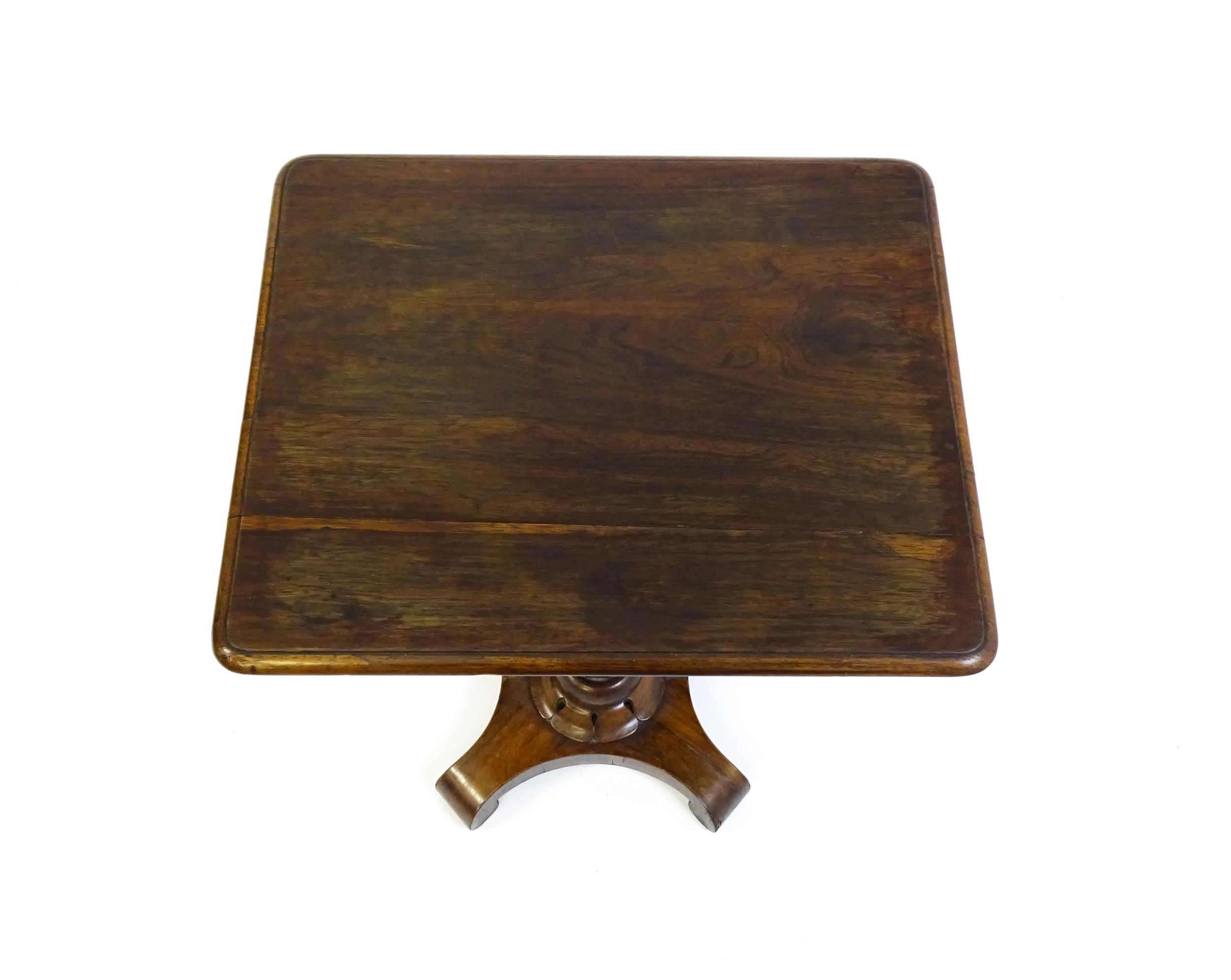 A 19thC rosewood occasional table with a canted pedestal above a carved plinth and quatre form - Image 3 of 6
