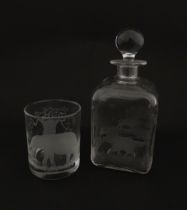 A Rowland Ward decanter glass with engraved Safari animal detail. Unsigned. Together with a similar