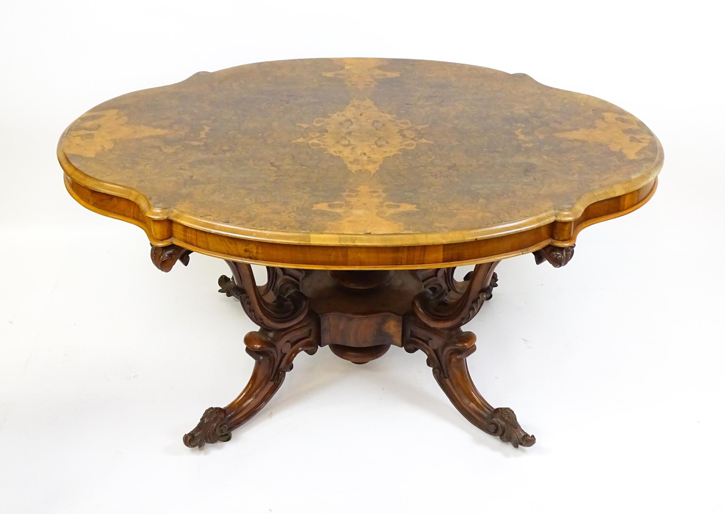 A 19thC burr walnut centre table with a moulded top above four acanthus carved supports, a large - Image 2 of 16