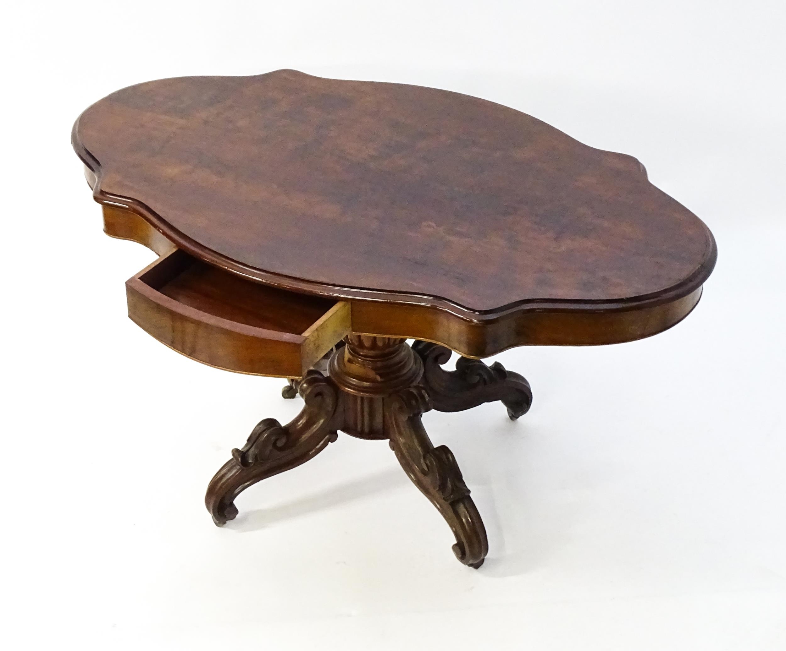 A 19thC mahogany centre table with a moulded top having two frieze drawers, the pedestal having - Image 5 of 9