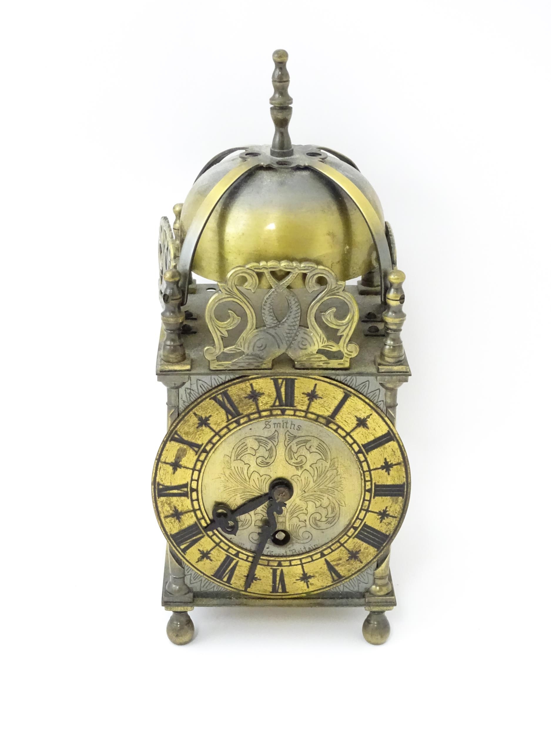 Smiths - Great Britain : A 20thC brass lantern clock by Smiths with engraved dial and Roman - Image 3 of 11