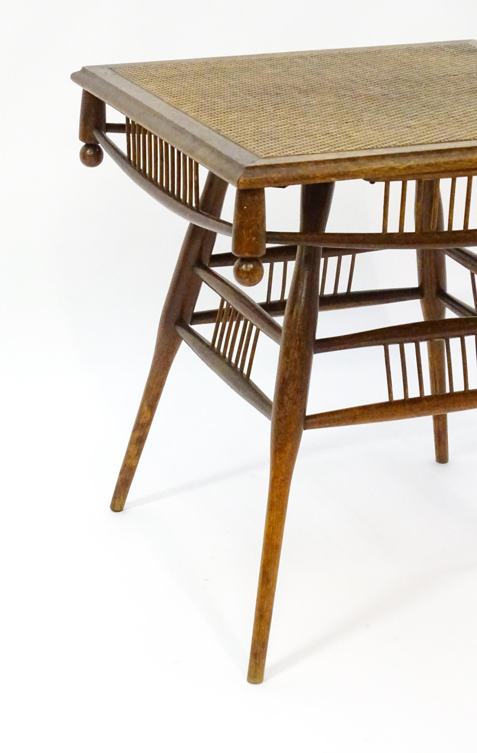 An unusual late 19thC Arts & Crafts table with a rattan inlaid moulded top above three tiers of - Image 9 of 10