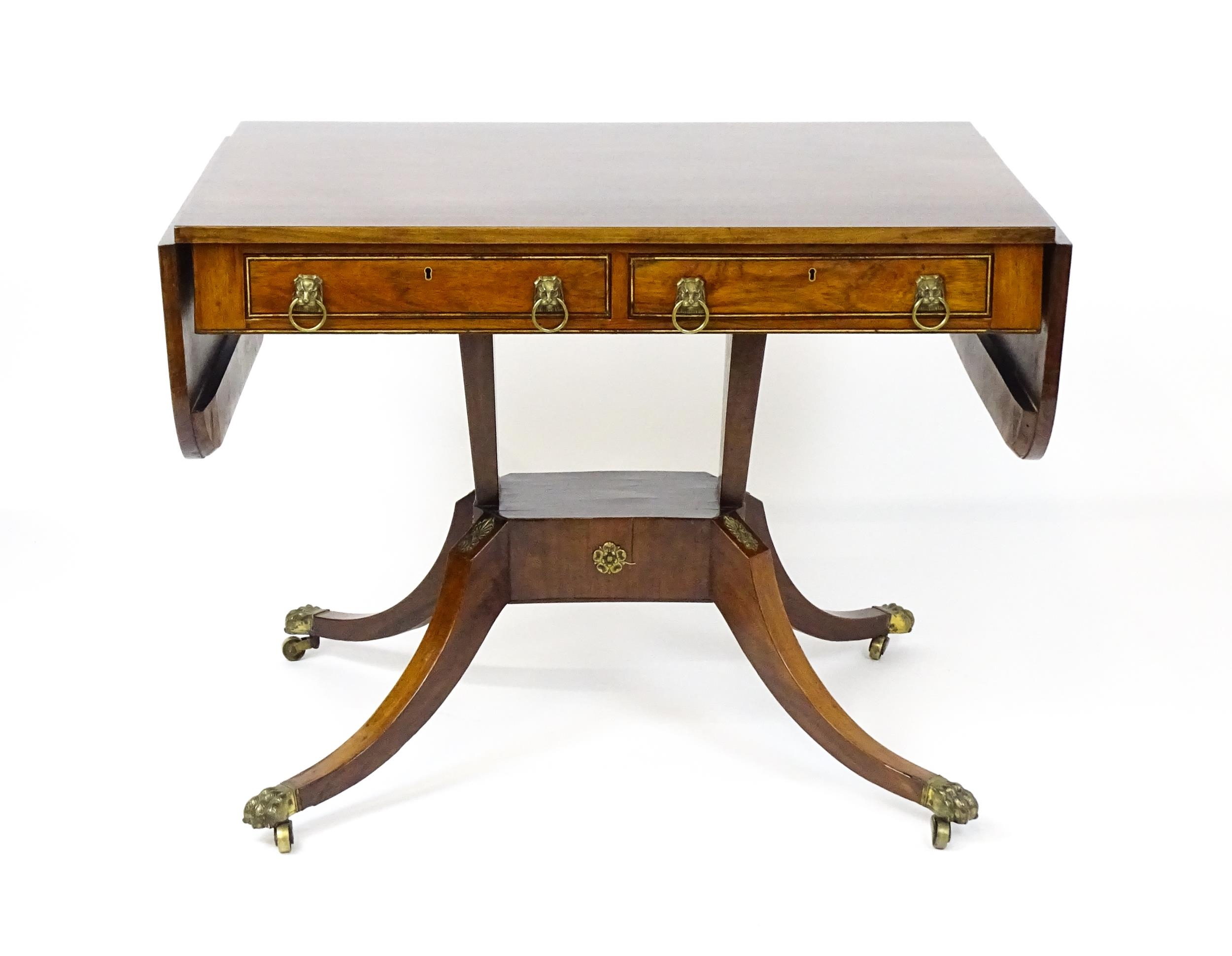 A 19thC and later sofa table with drop flaps to either side, two small frieze drawers opposing two - Image 5 of 10