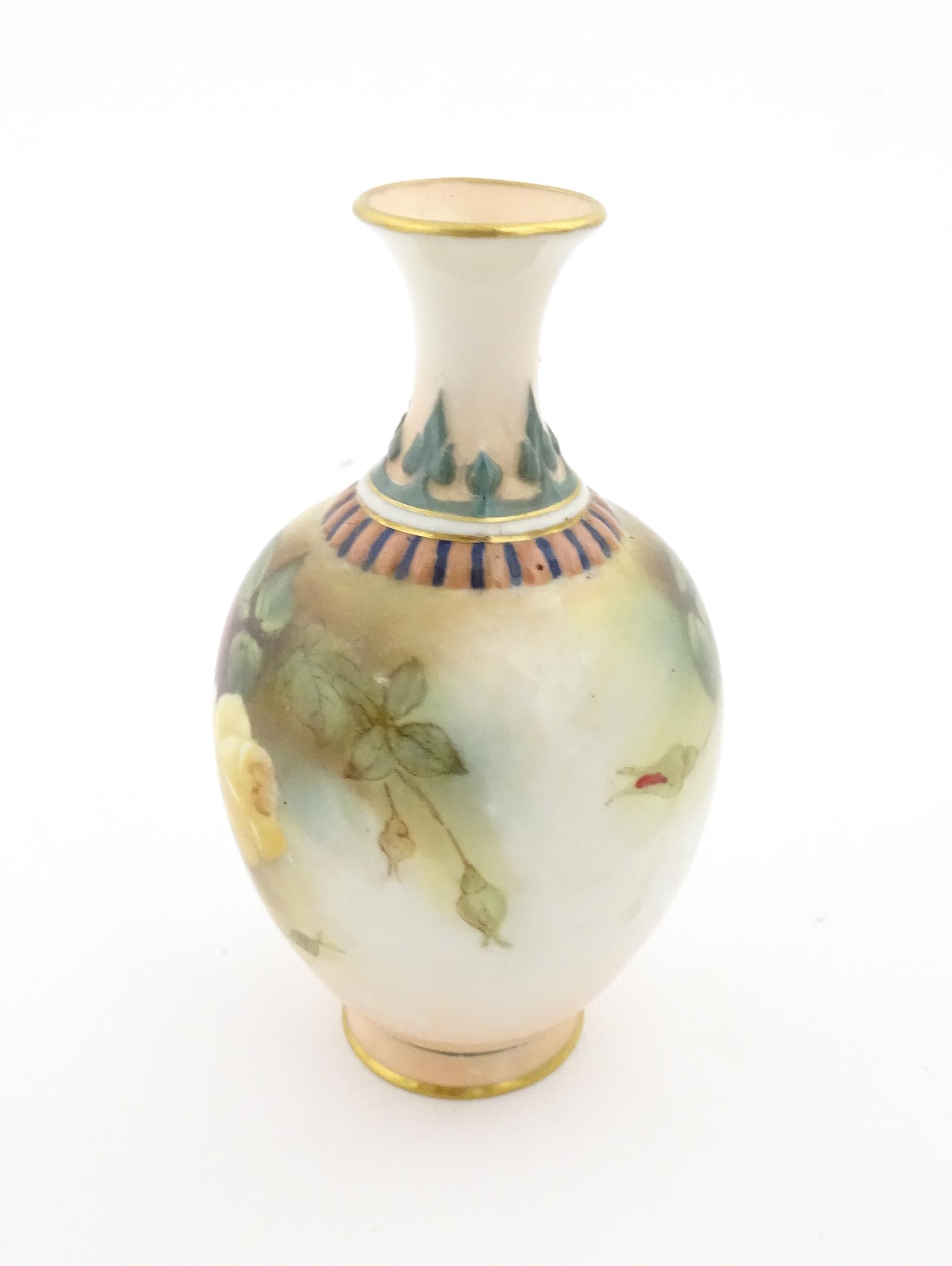 A Royal Worcester vase with hand painted decoration depicting pink and yellow roses, with gilt - Image 3 of 7
