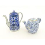 A blue and white teapot with floral, foliate and insect decoration. Together with a blue and white