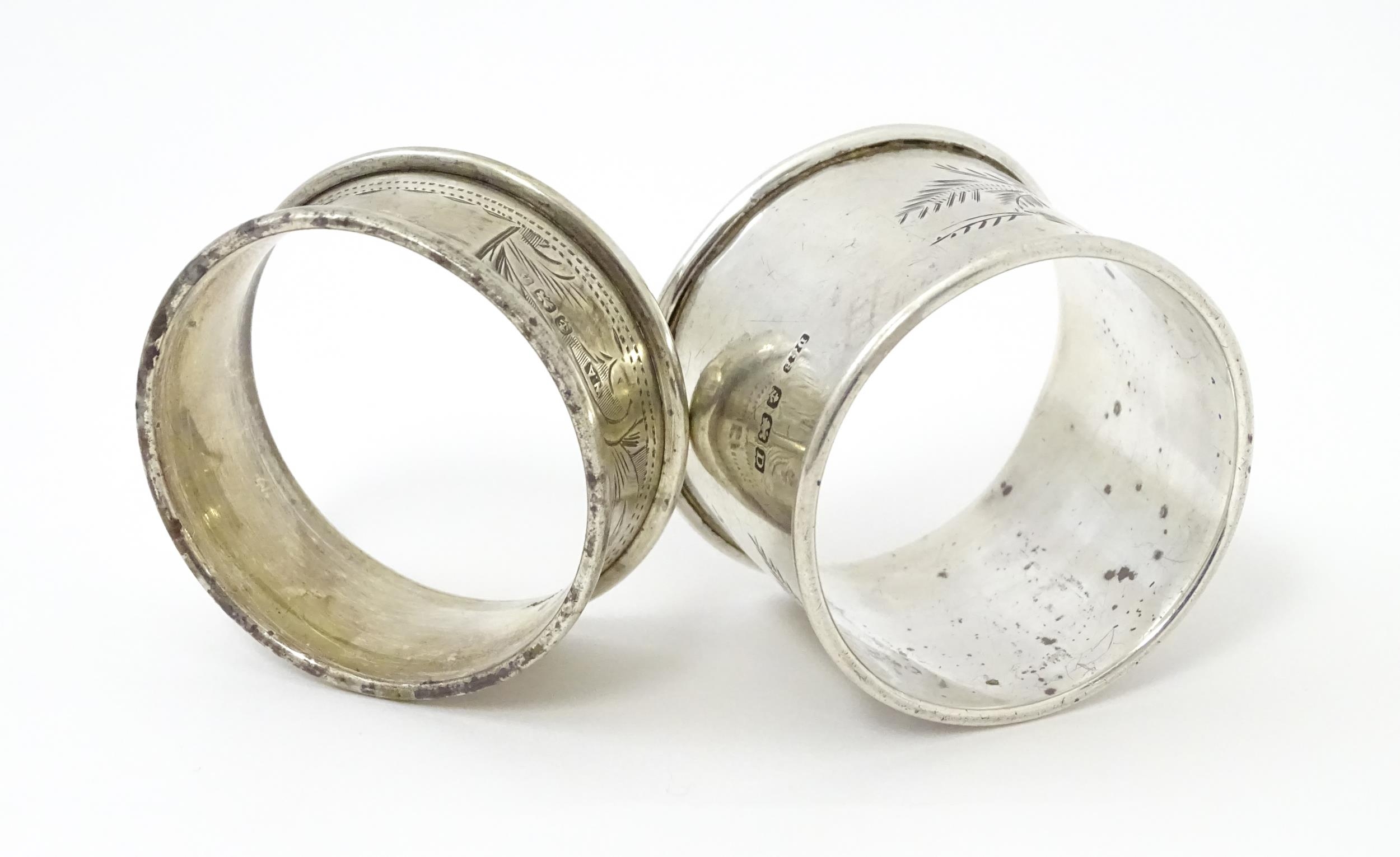 Two silver napkin rings with engraved foliate decoration, one hallmarked Birmingham 1928 maker - Image 2 of 8