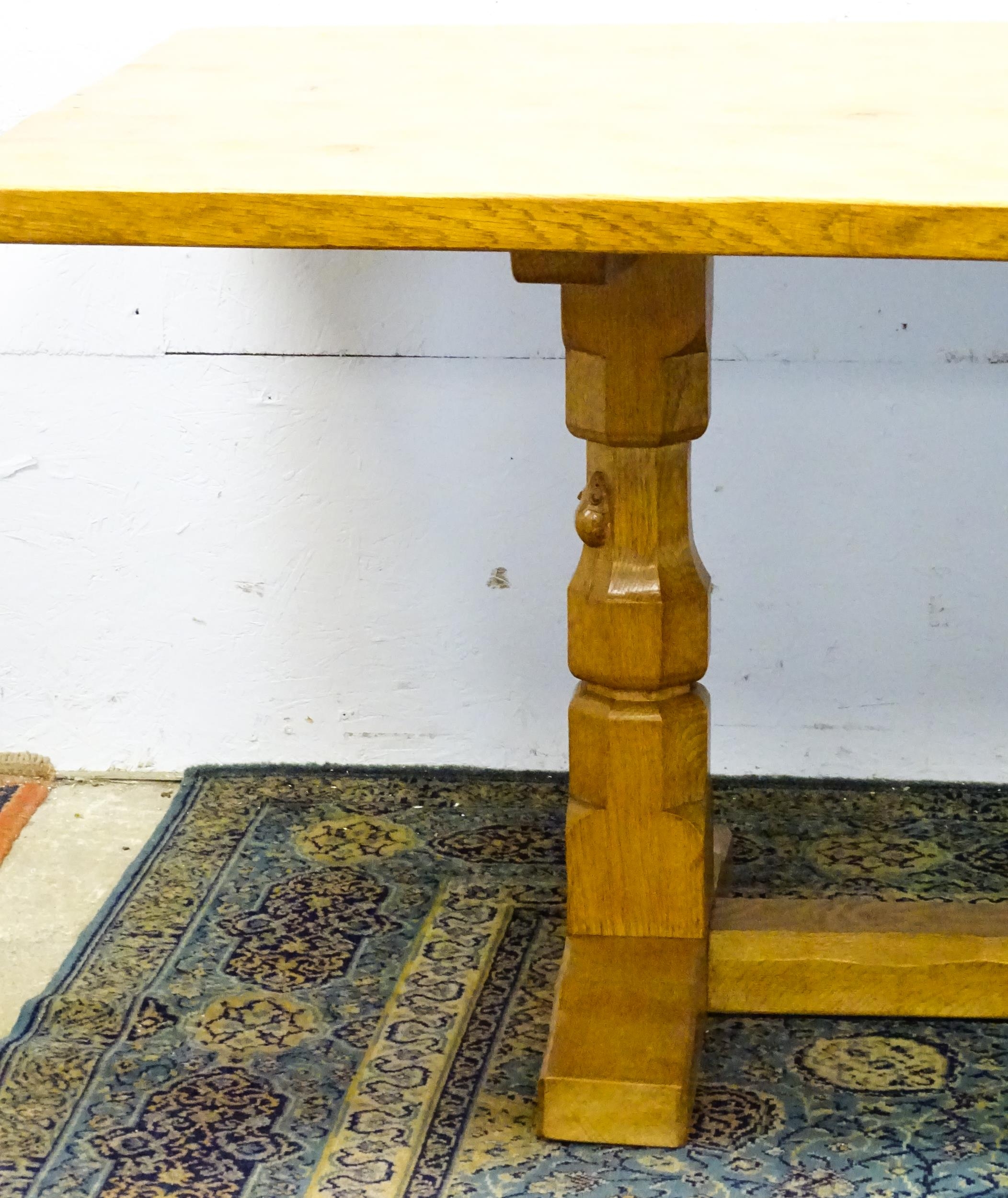 A mid 20thC Robert 'Mouseman' Thompson dining table. The 8ft long oak table top with an adzed finish - Image 19 of 22