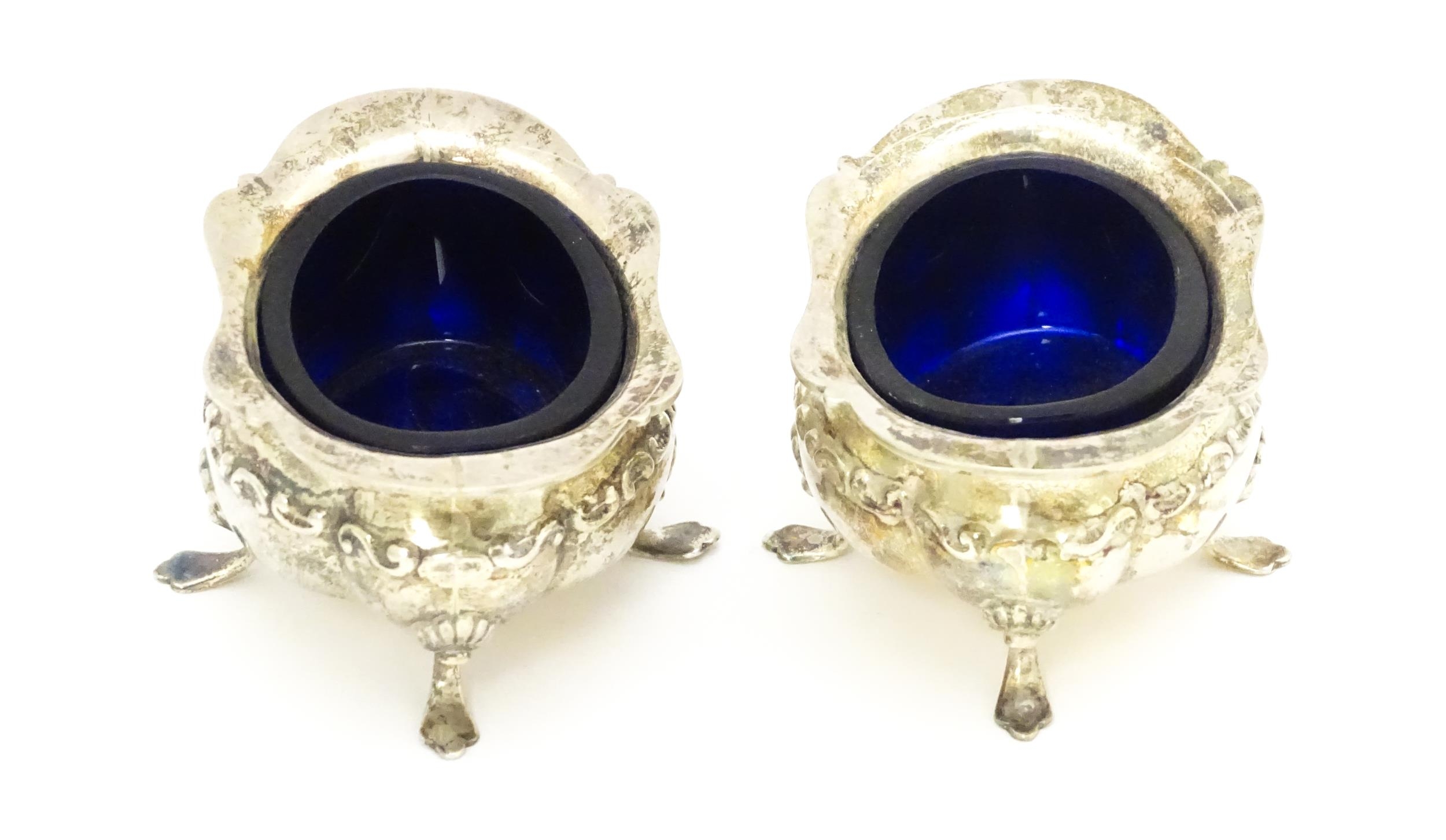 A pair of silver salts with blue glass liners, hallmarked Birmingham 1908, maker John Nowill & Sons. - Image 5 of 10